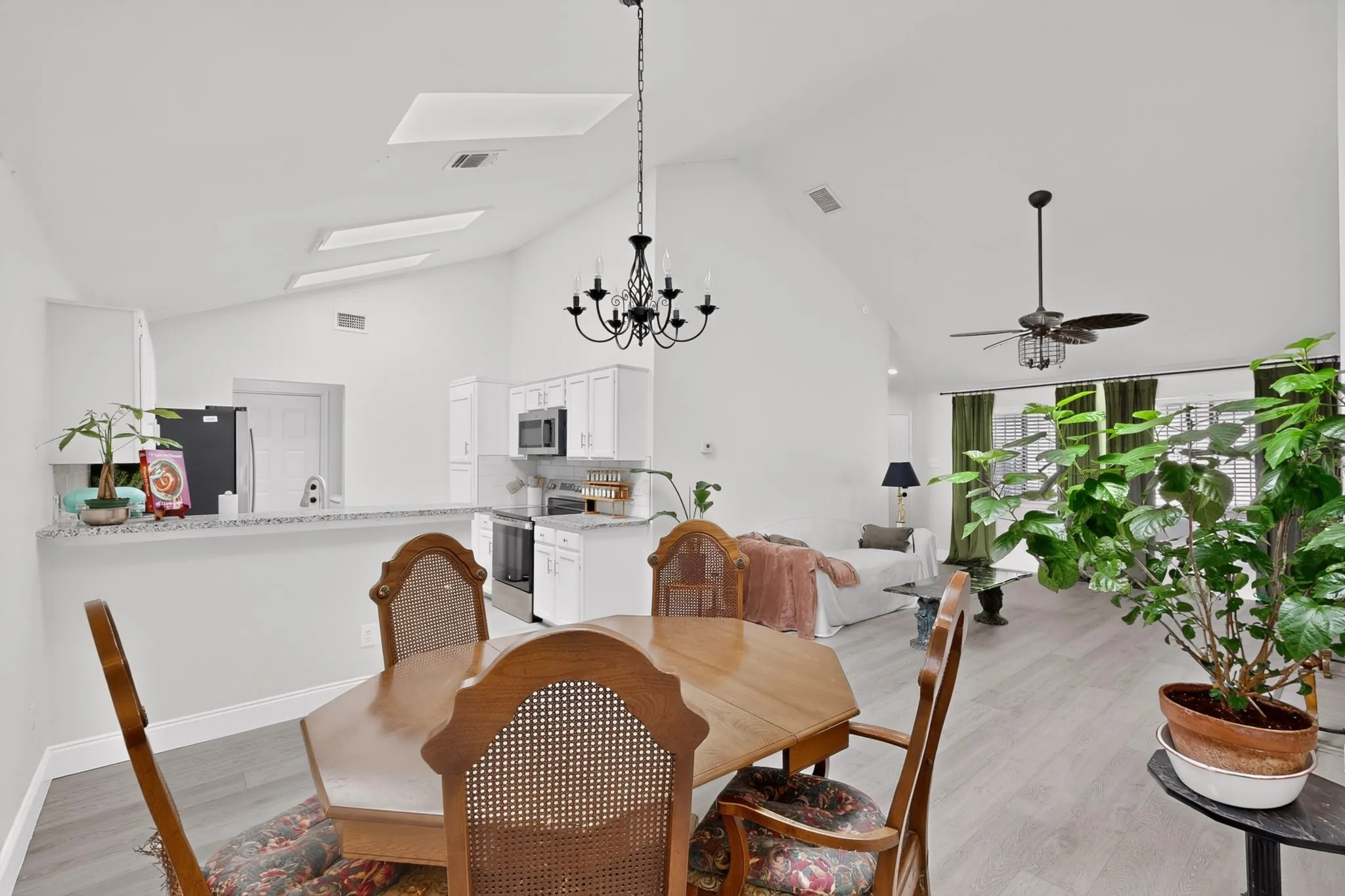 Vaulted ceilings with skylights and an open-concept layout