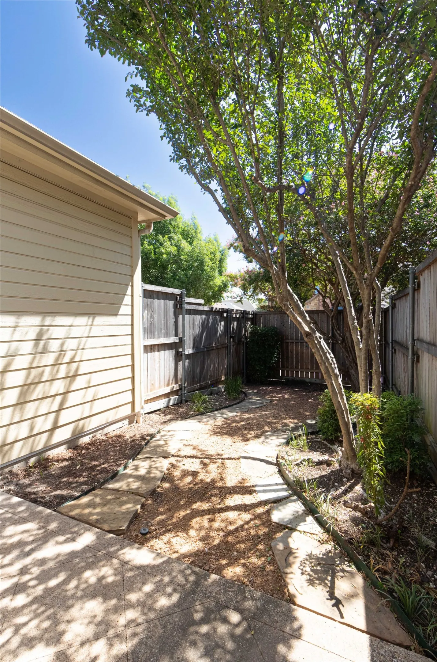 Private fenced courtyard.