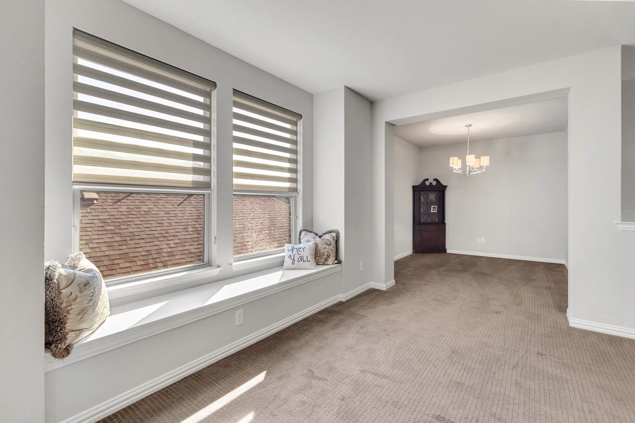 Upstairs game room with natural light.