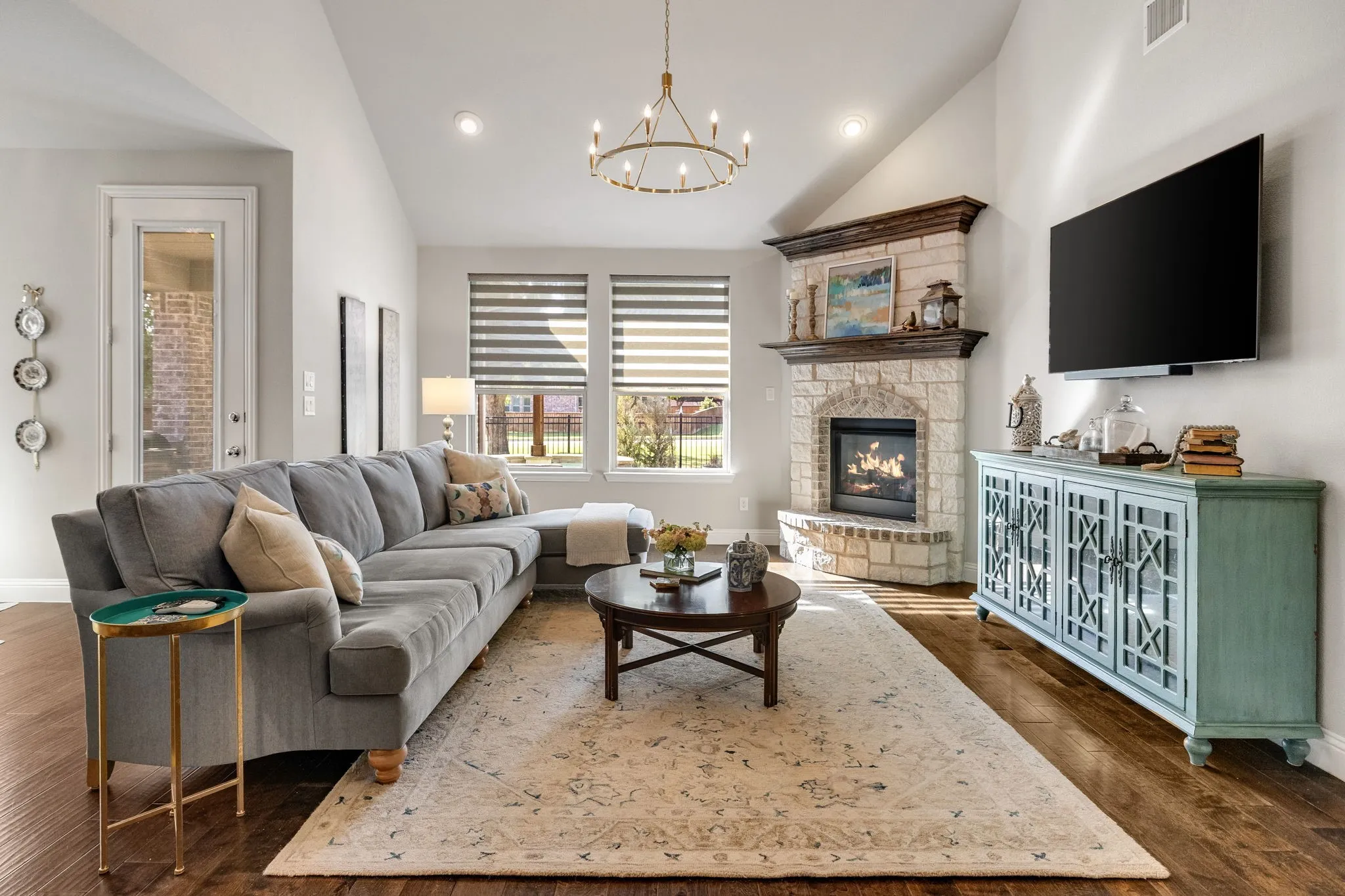 Grand living room with vaulted ceiling.