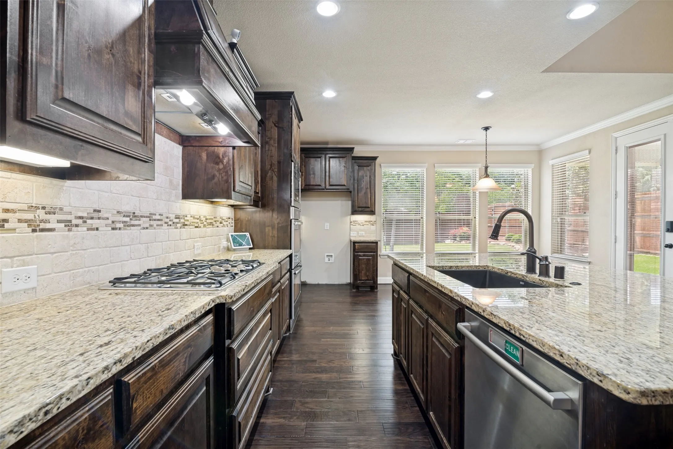 Kitchen with breakfast area in background.