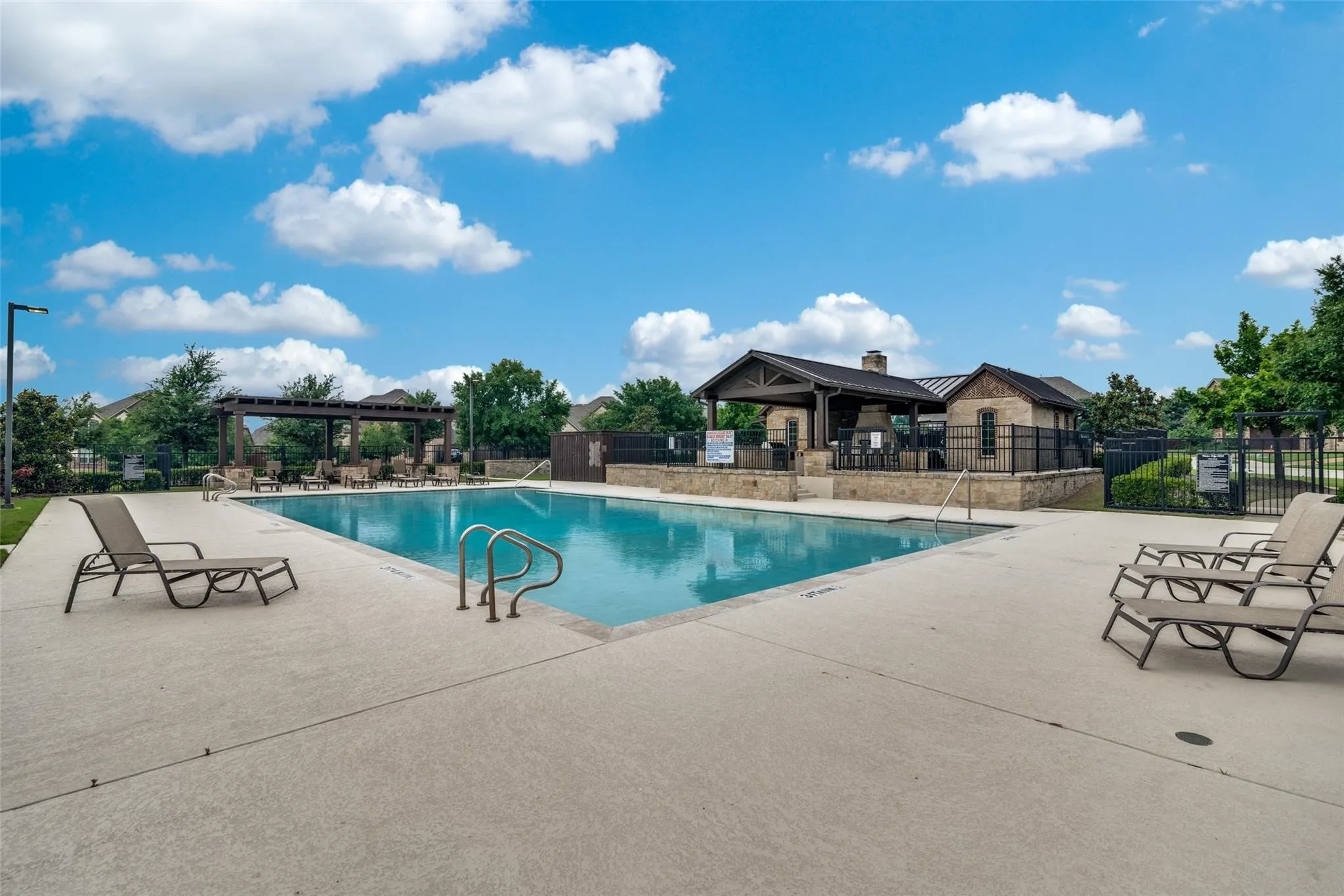 Neighborhood pool and outdoor entertainment area.