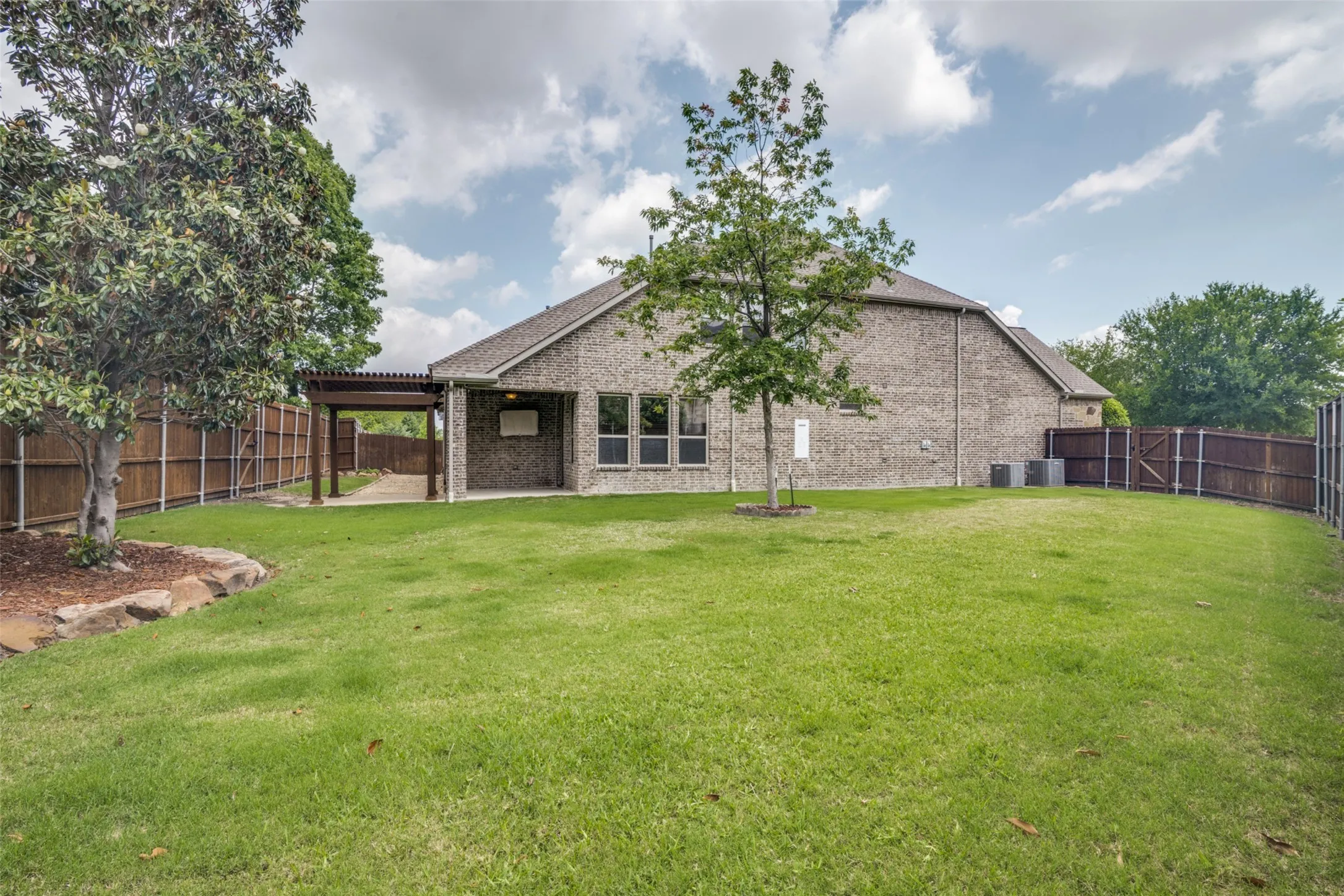 Side yard facing house.