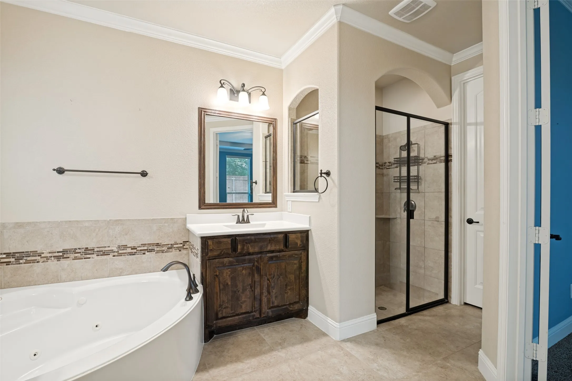 Separate shower in primary bath.