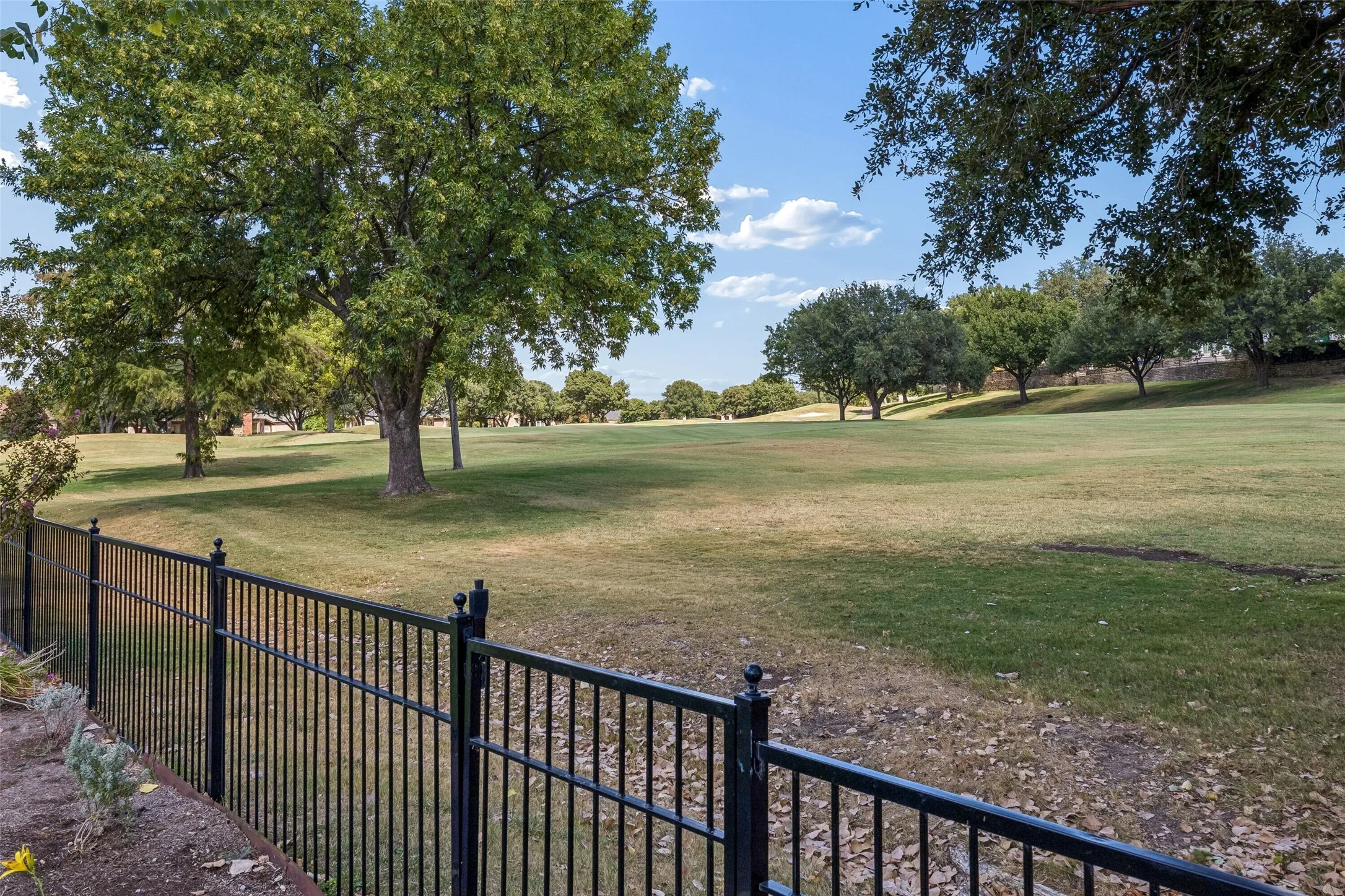 View from fence onto golf course