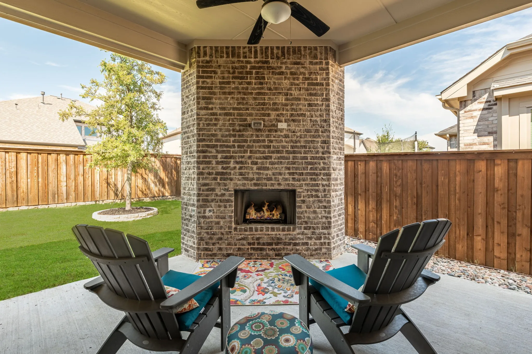 Enjoy the cozy covered patio and fireplace!