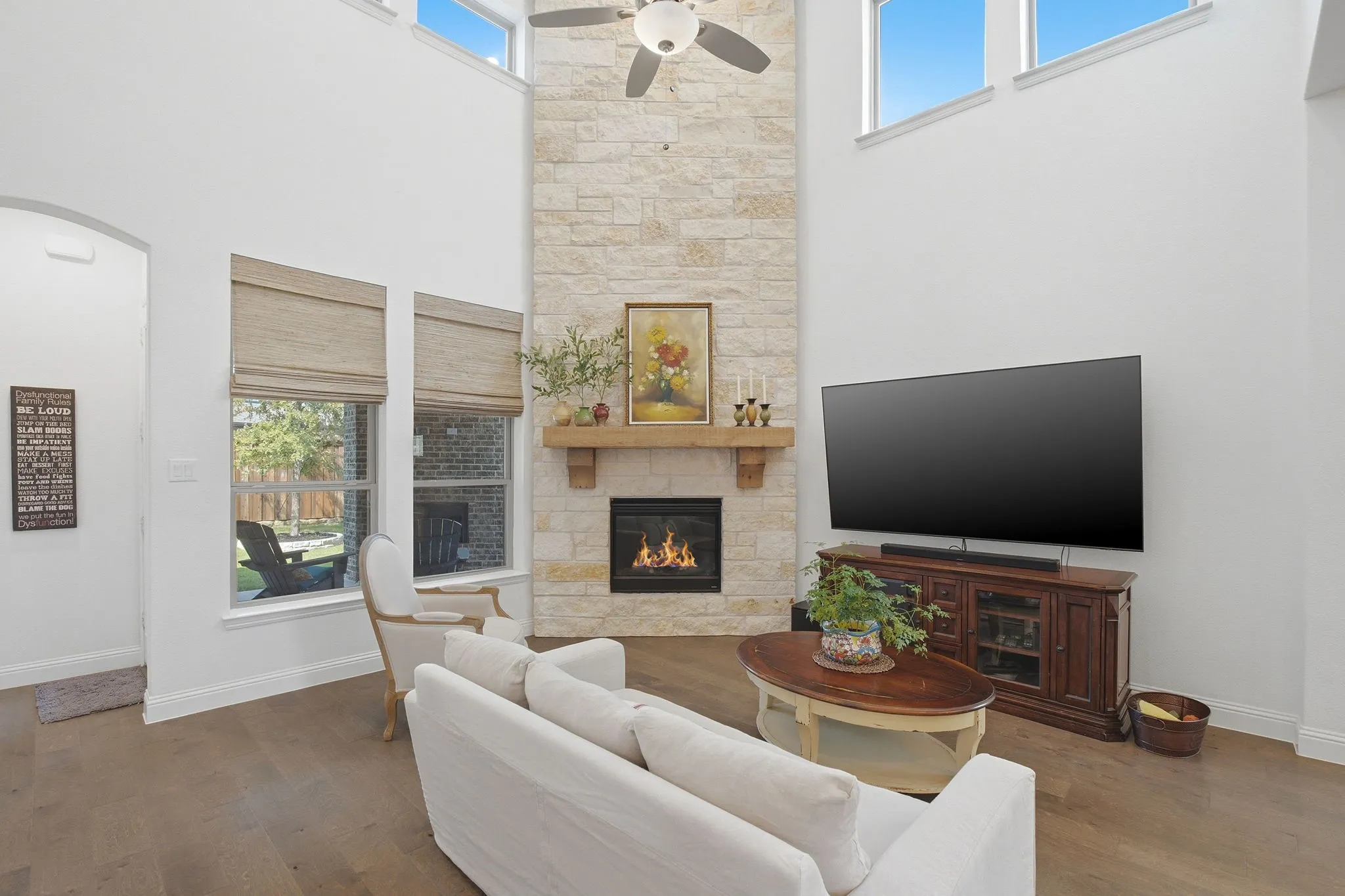 Amazing stone fireplace and tons of natural light!
