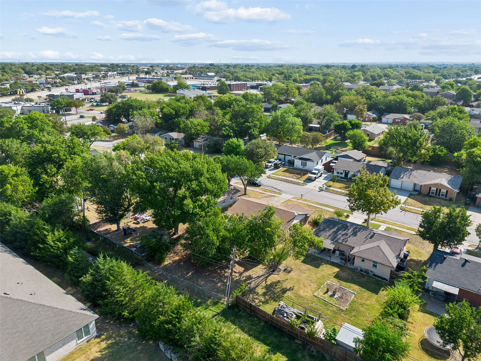 Residential area featuring established landscaping and mature trees