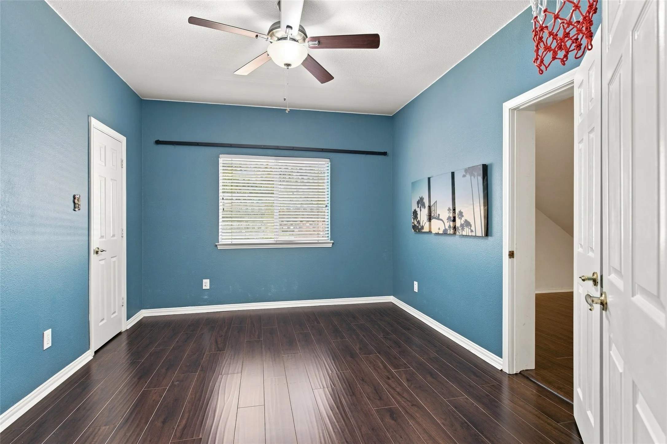 Bedroom with closet and finished bonus room adjacent.