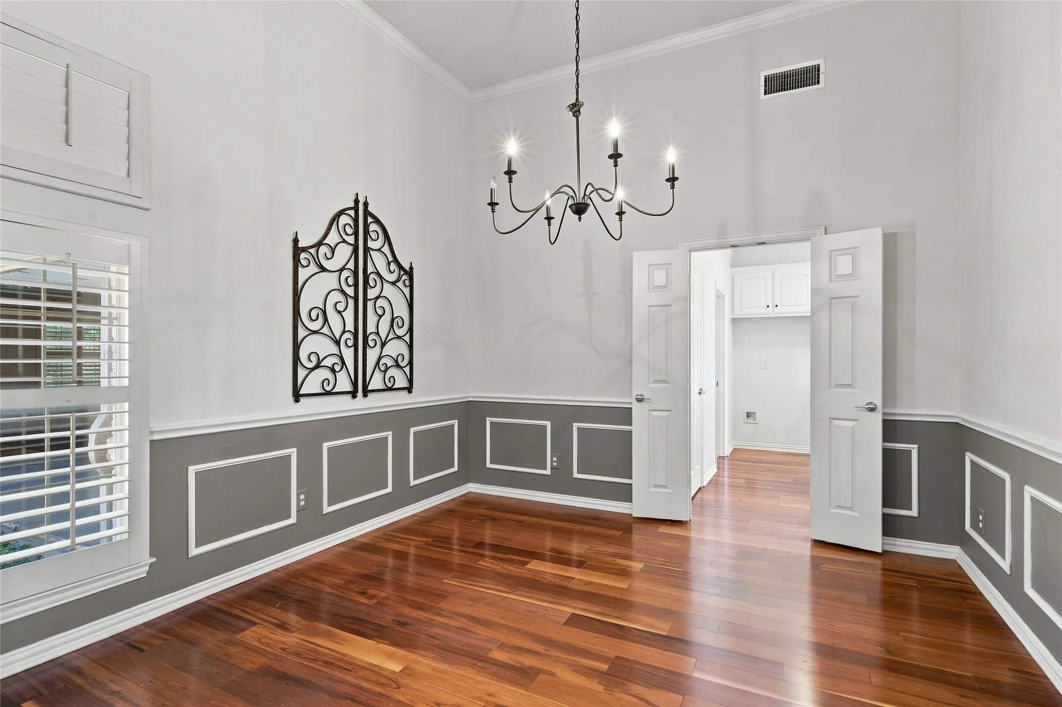 High vaulted ceilings in formal dining area.