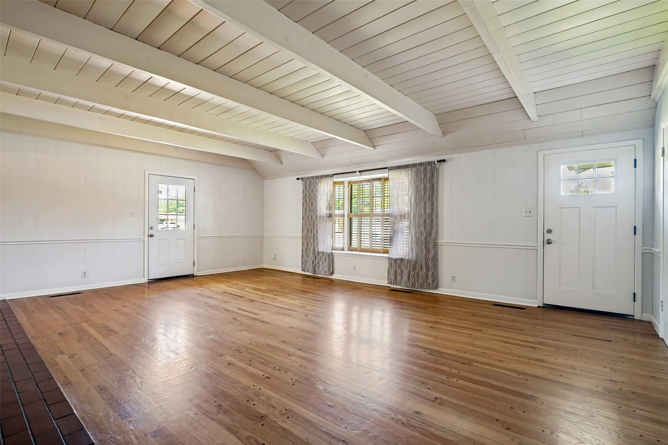 Gorgeous original floors and look at that Custom Built Ceiling!