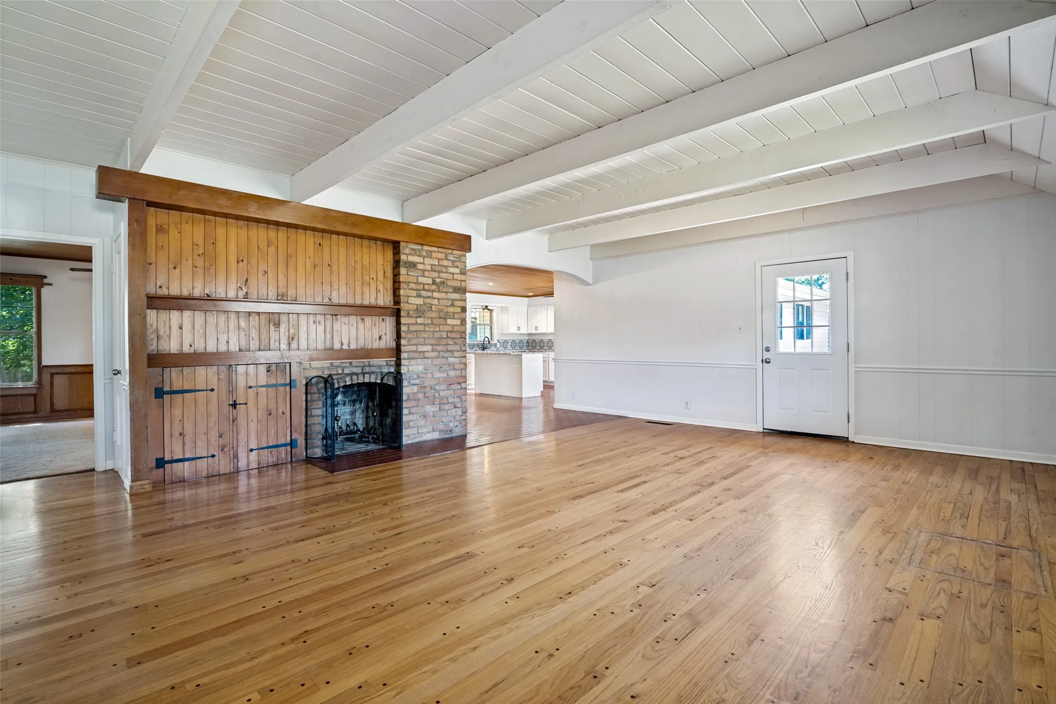 Wood Burning Stove keeps you cozy and love the Brick Accents here too!