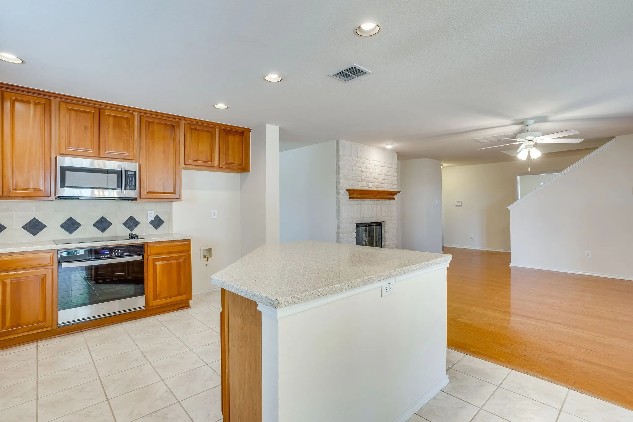 Kitchen open to Family Room/Den, and Breakfast Area