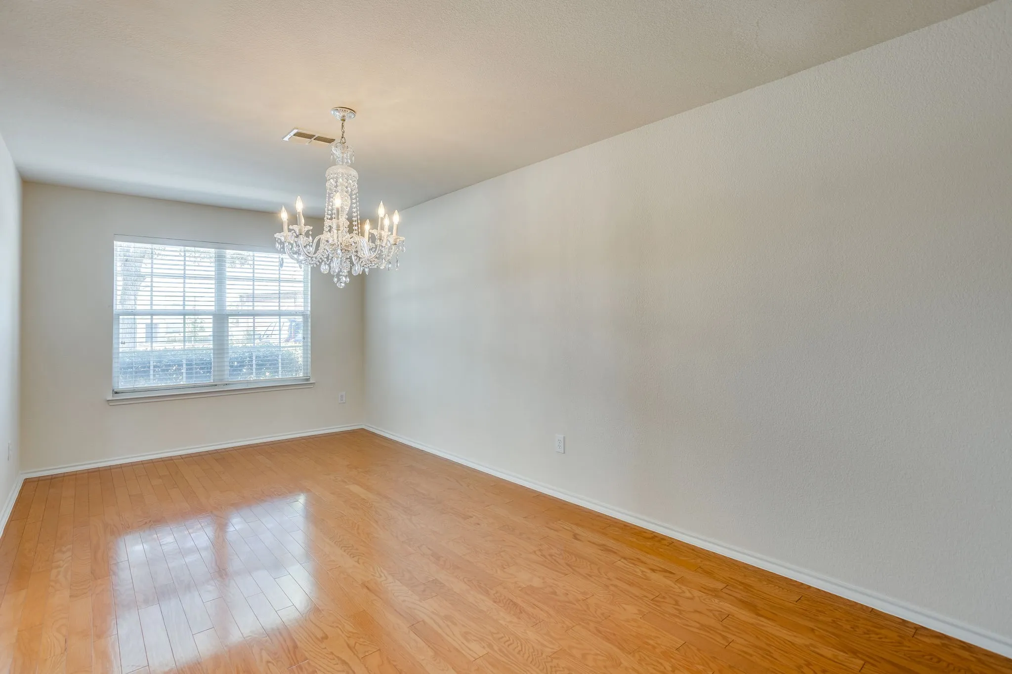 This could serve as a Dining room or second Living/Den area.