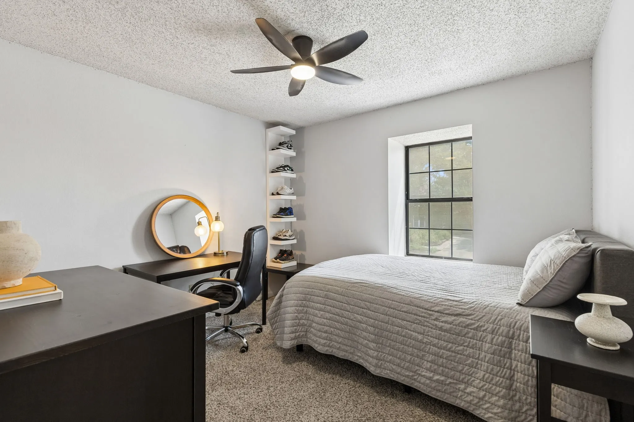 Secondary Bedroom with Neutral Carpet, Ceiling Fan, and Large Window