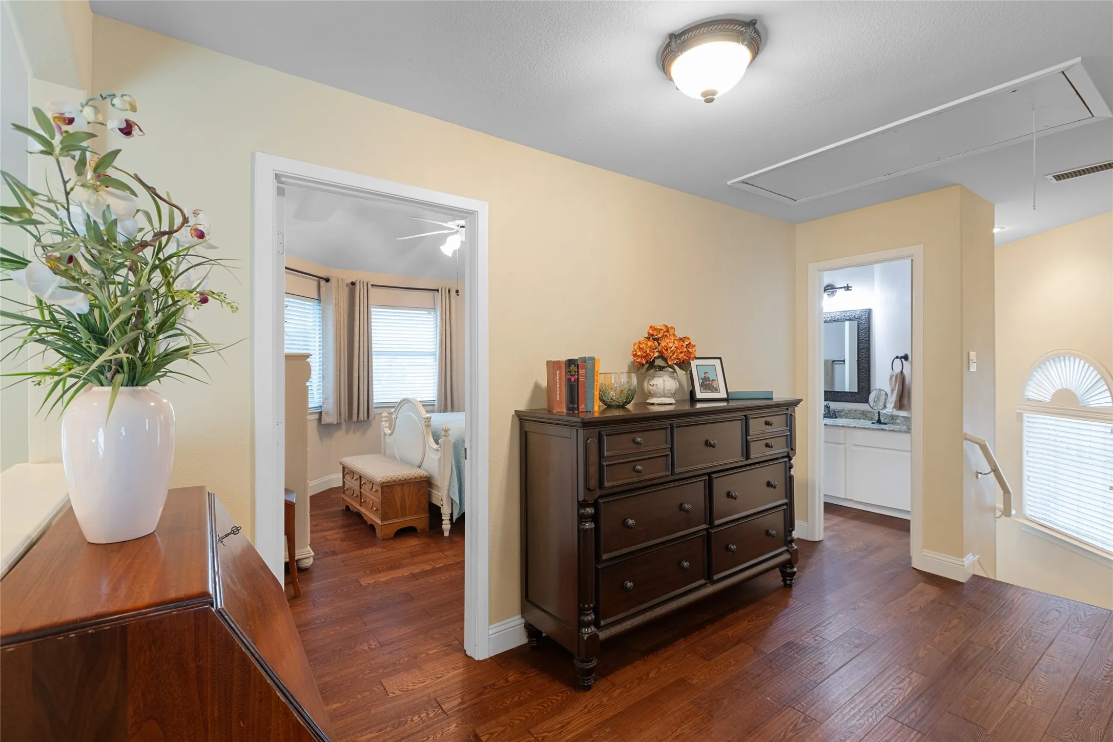 Upstairs landing area between the 3 Bedrooms with Beautiful Wood Floors