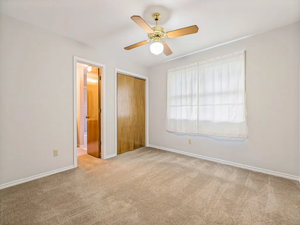 Upstairs bedroom with walk-in closet and bath.
