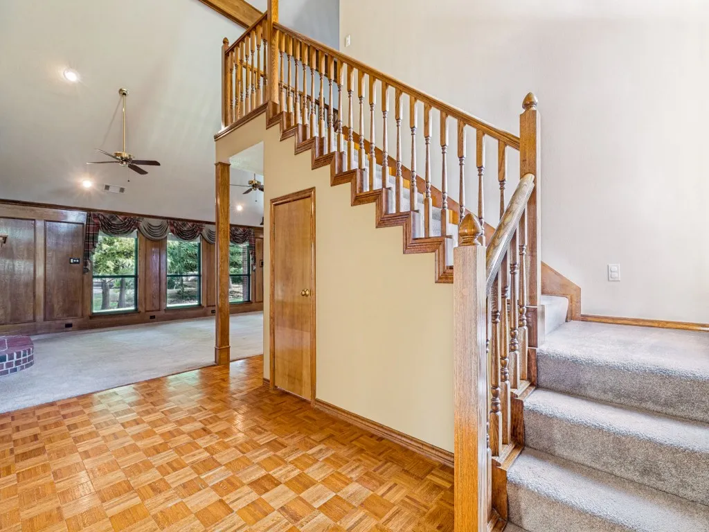 Stairs to loft, game room, 4th bedroom and bathroom.