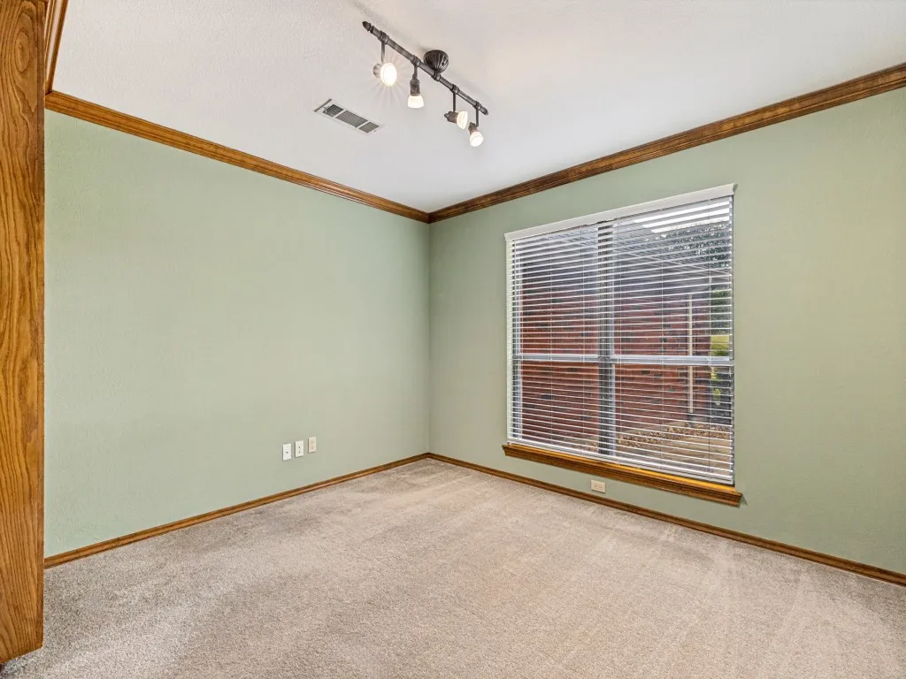 Office with double doors and built in cabinet