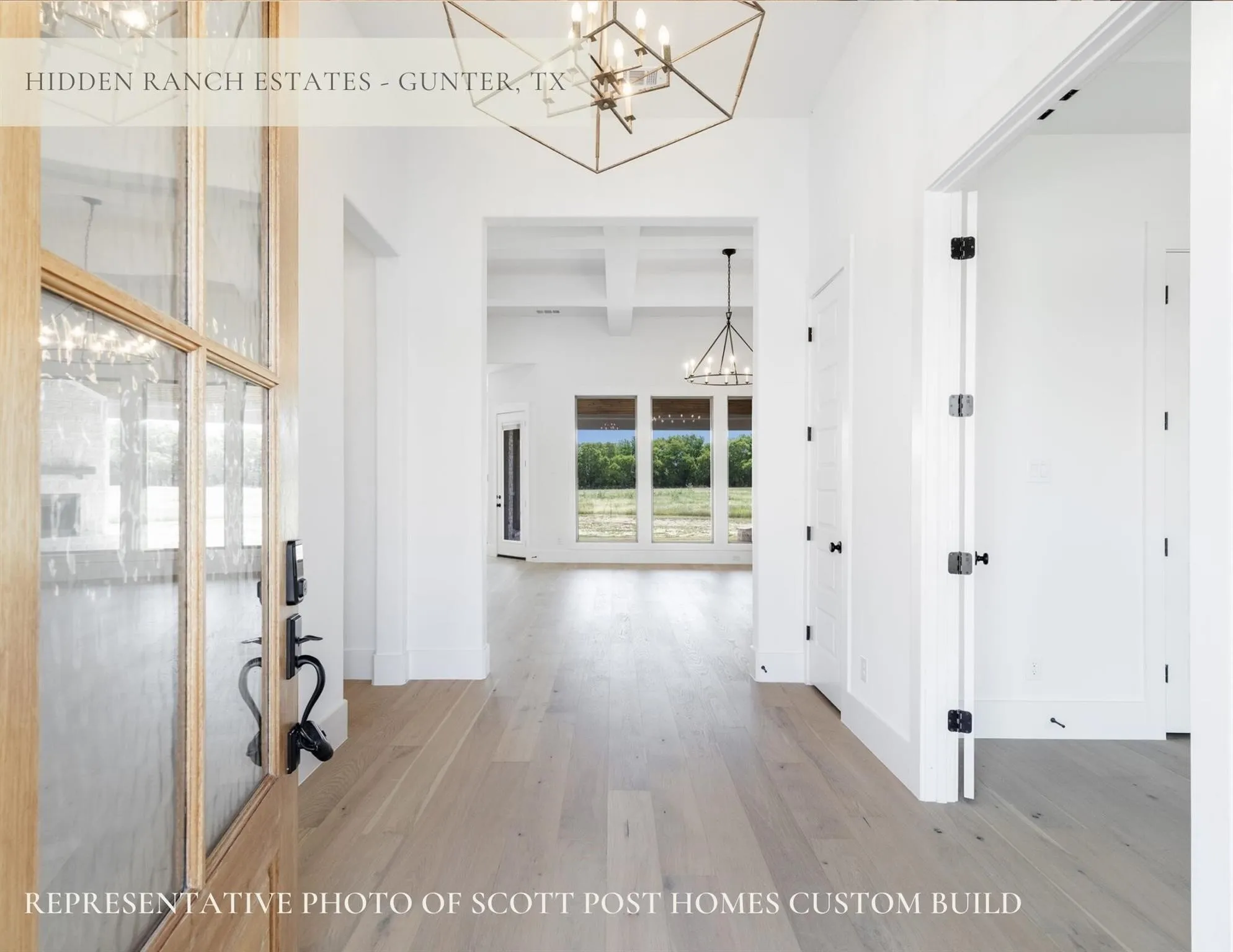 Light wood-finish flooring, white walls, transom window, and a modern geometric chandelier