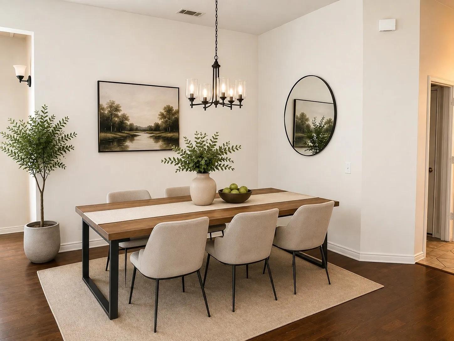 Hardwood-finish flooring, recessed wall niche, wall sconce lighting, ceiling-mounted chandelier, and a solid core door