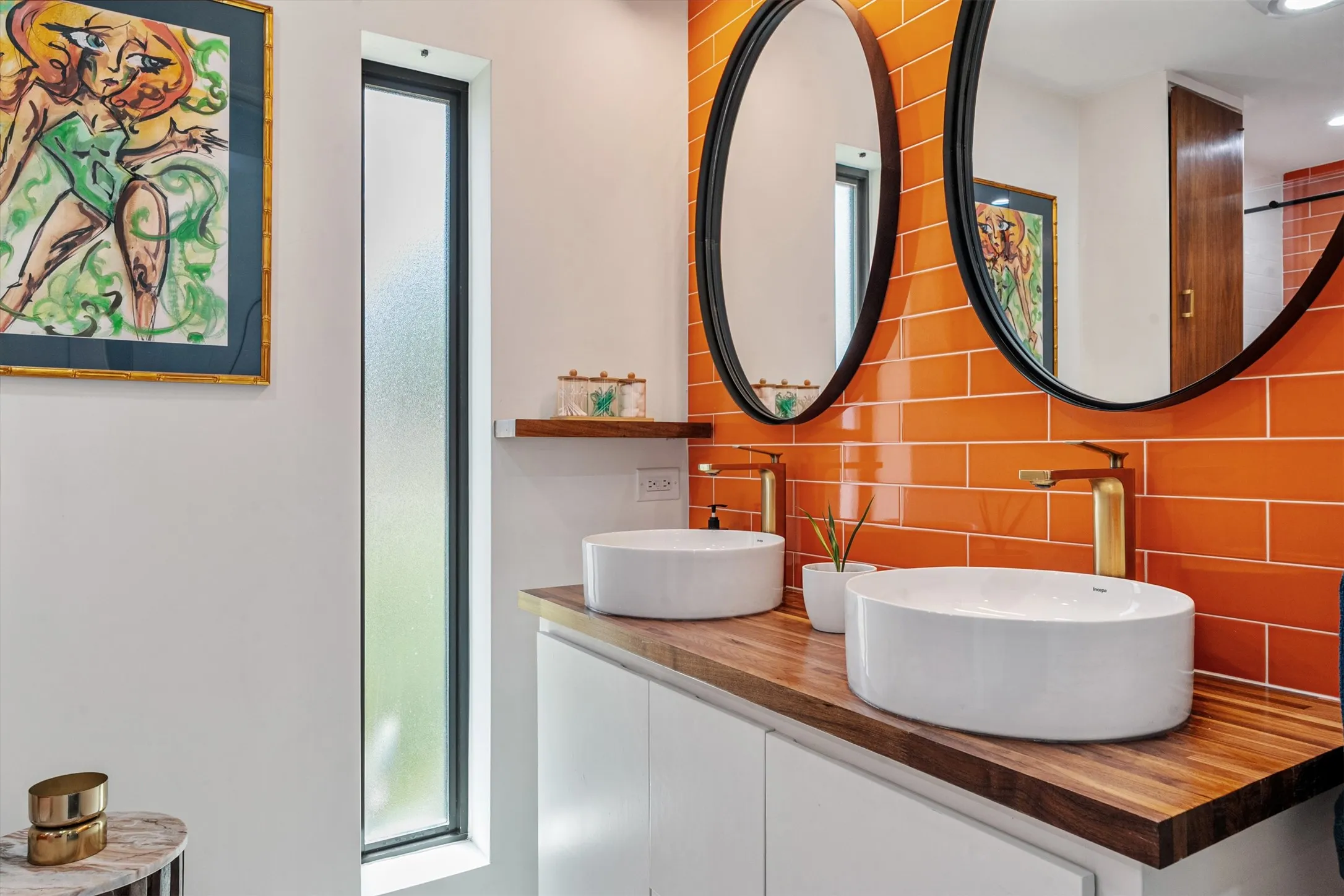 vibrant color, double sink vanity, penny white tile floors, and floating cabinet
