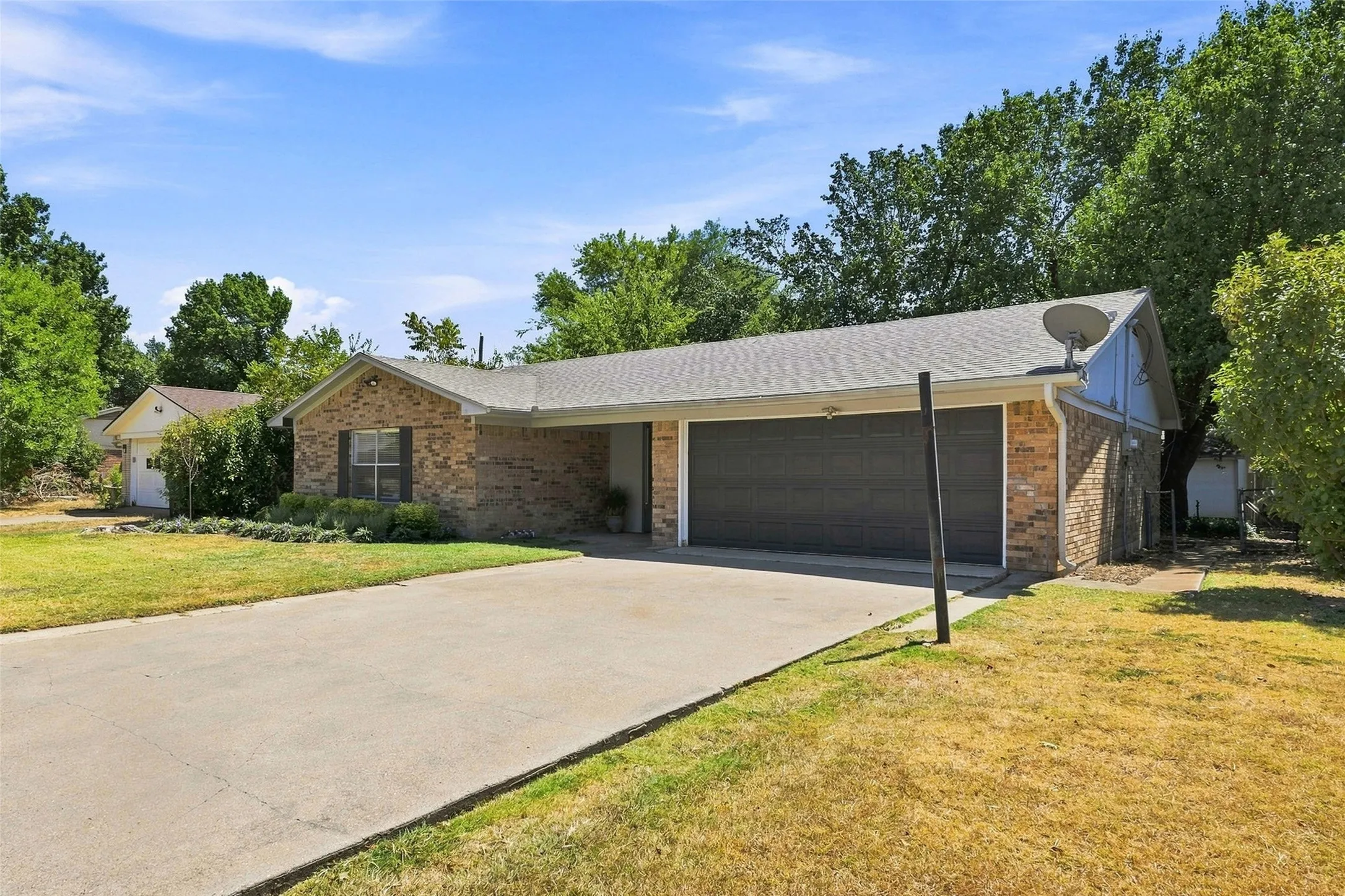 Two car garage and plenty of parking in the driveway
