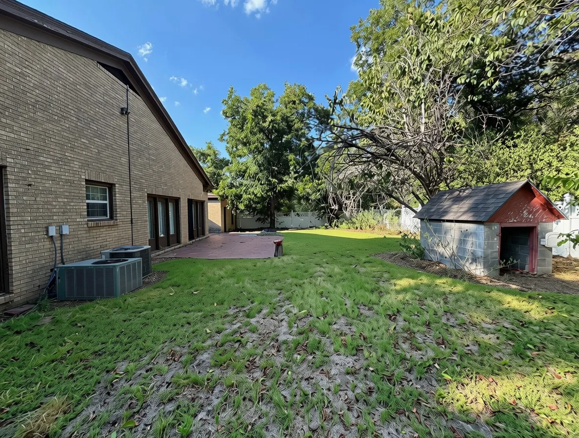 Brick exterior, multiple window openings, and a red brick paver patio