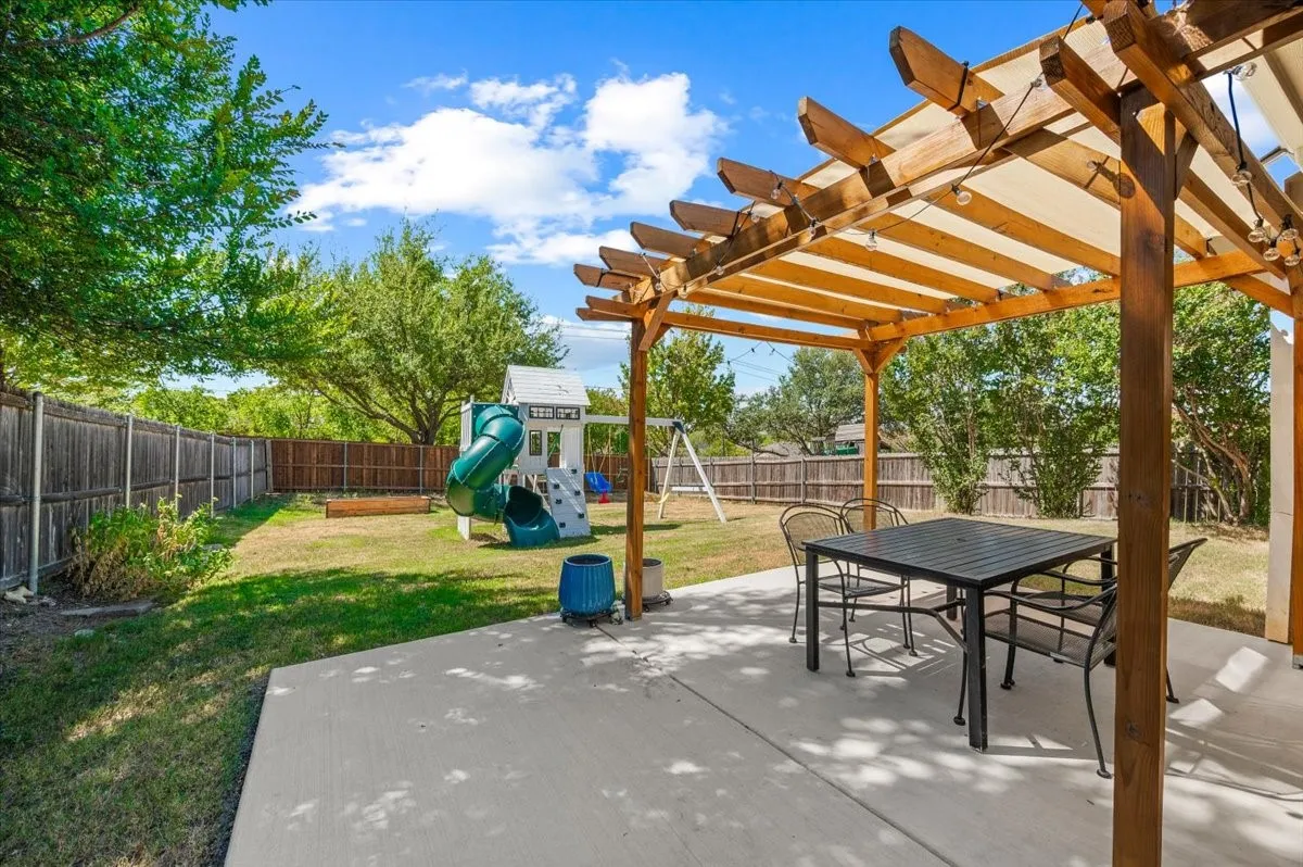 Extended patio and pergola.