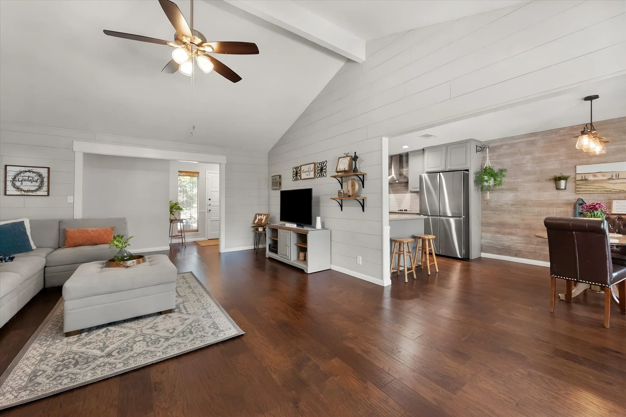 Open large living seemlessly flowing into the eat-in kitchen