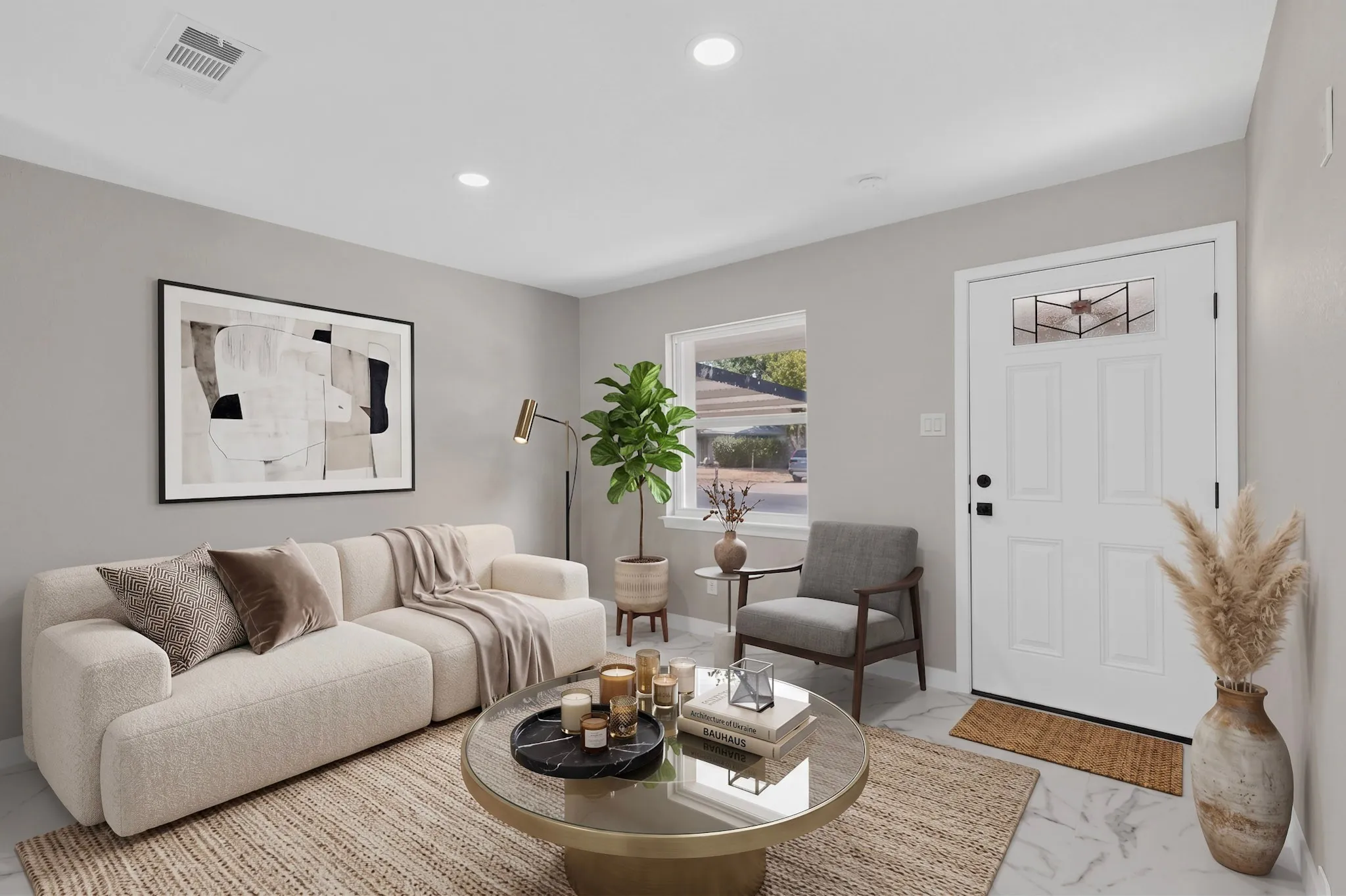Recessed ceiling lighting, durable tile flooring, and a white paneled entry door with transom window