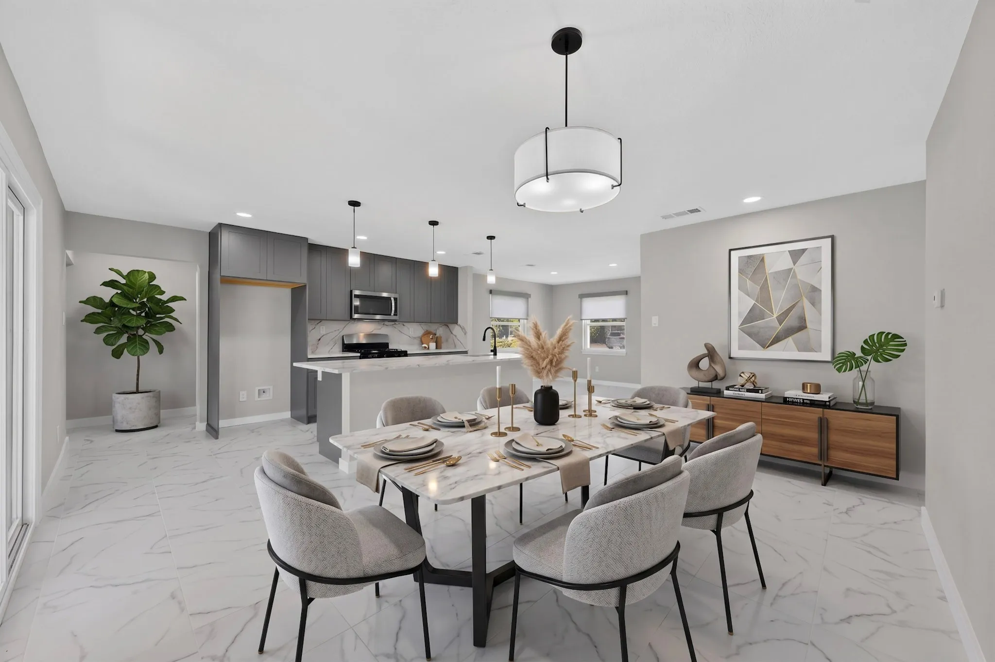 Open-concept living space with large format tile flooring and recessed lighting