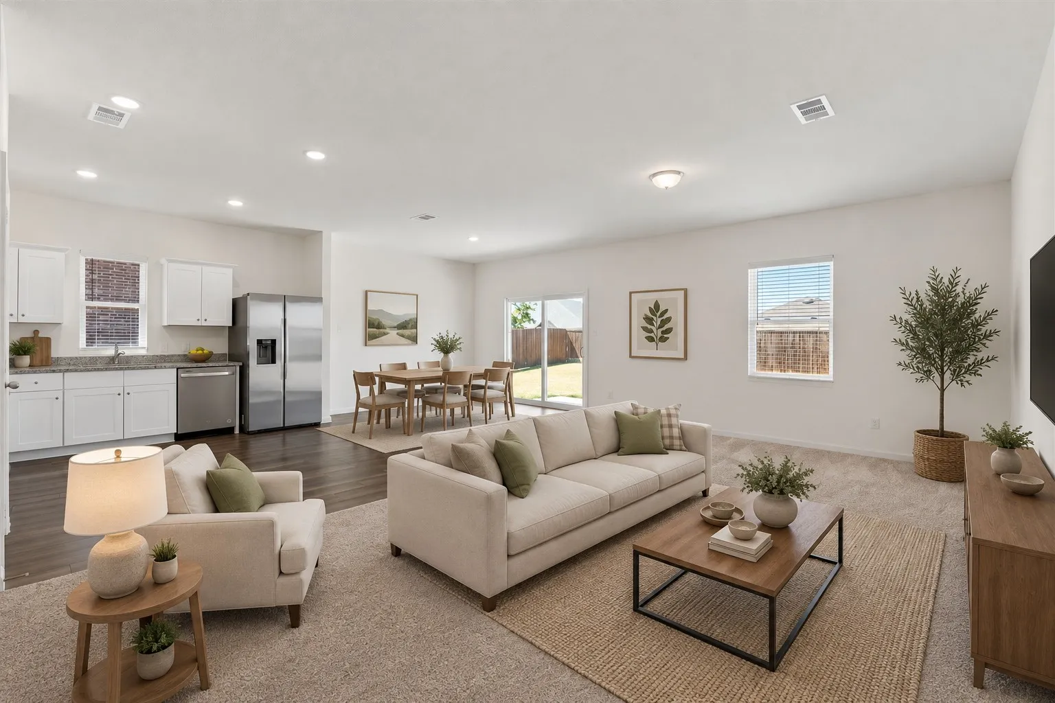 *Virtually Staged* Open concept living room, dining and kitchen. Great space for entertaining and relaxing after a long day.