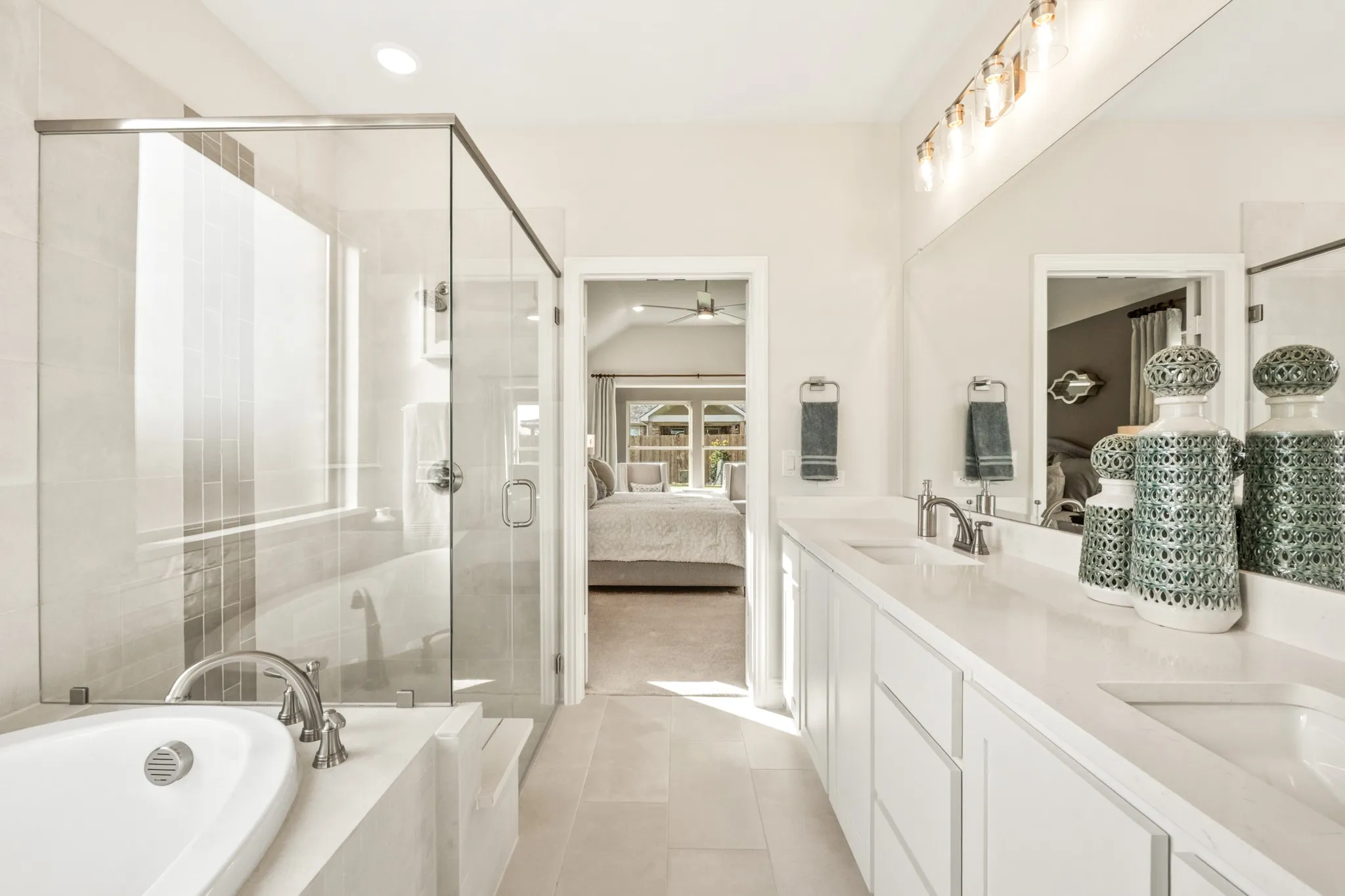 Dual vanity with undermount sinks and extensive countertop space