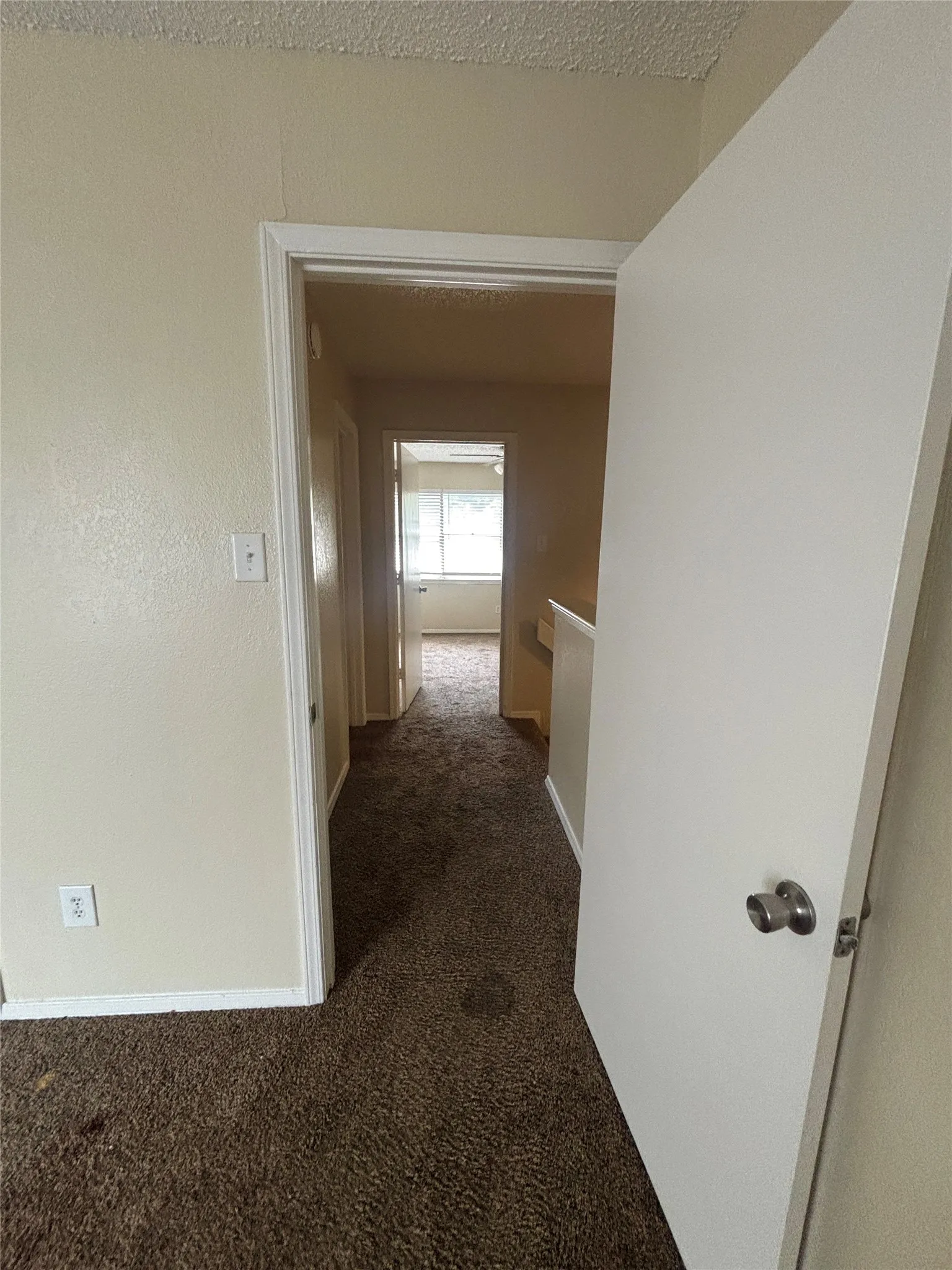 Hallway between bedroom 1 and 2 with hallway bathroom in between