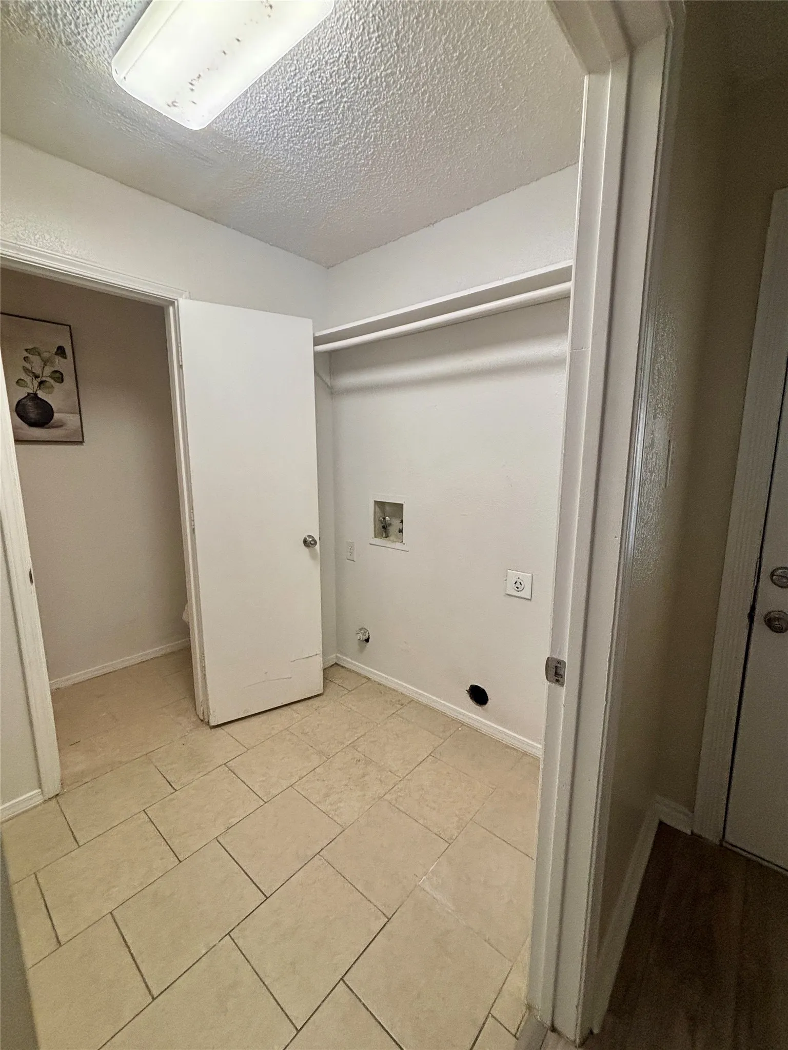 Pantry and laundry area is a combo with half bath