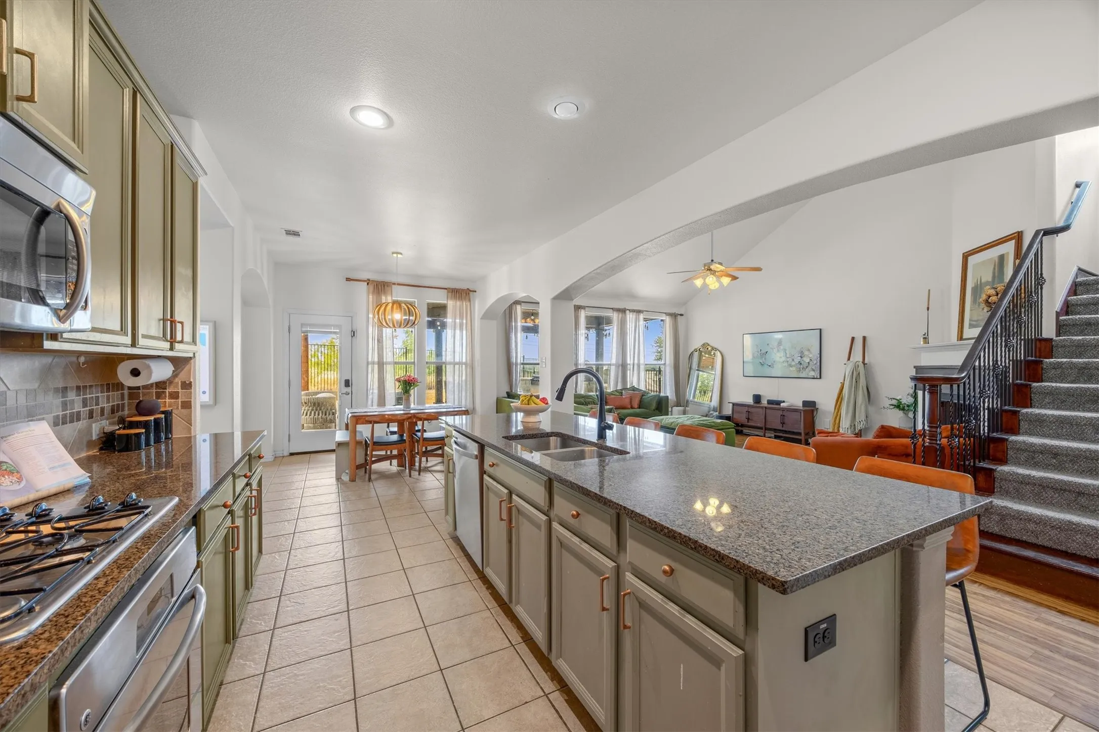Notice the current green designer cabinetry!