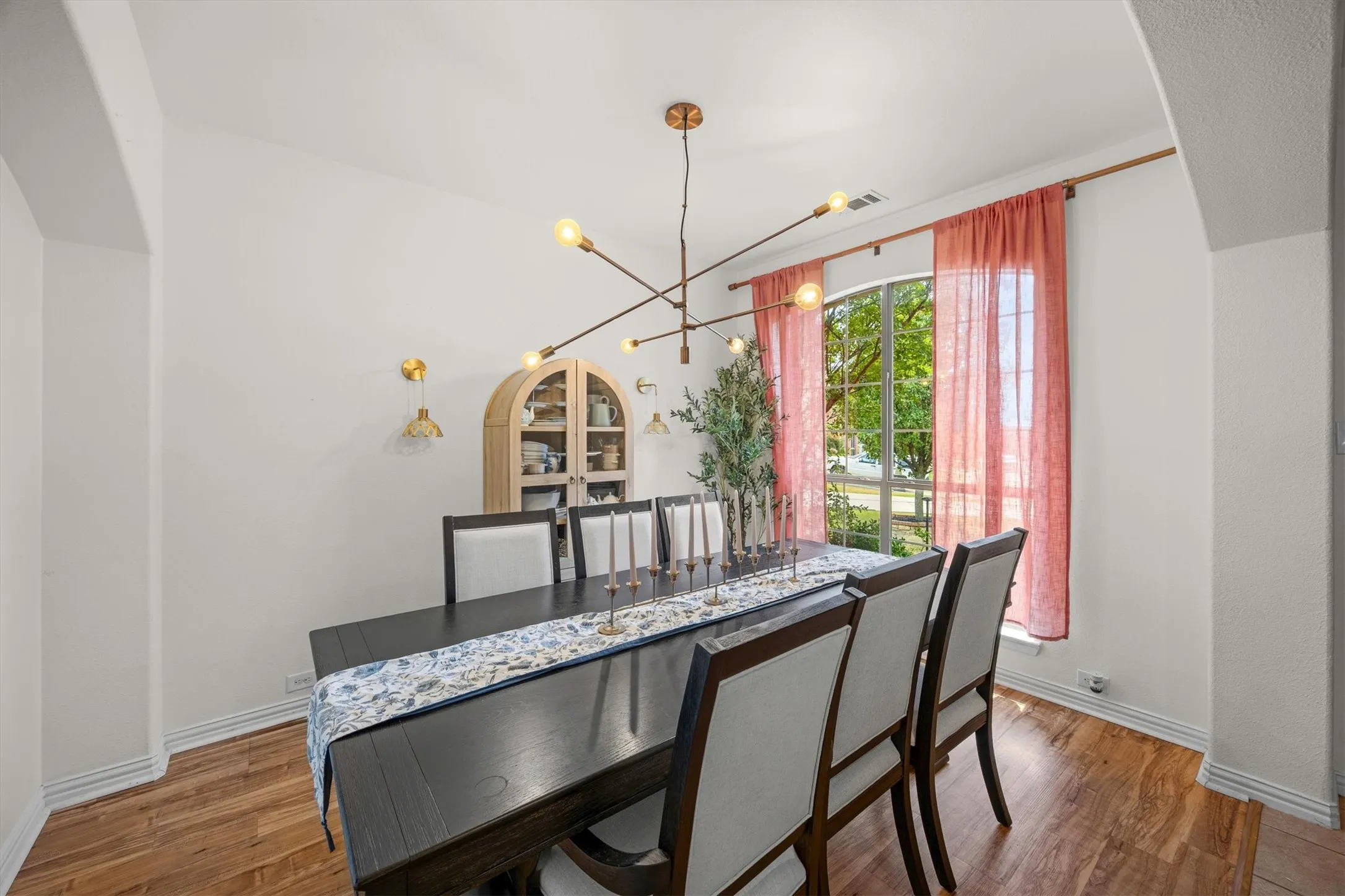 The dining area is to the right of the front door and is light and bright!