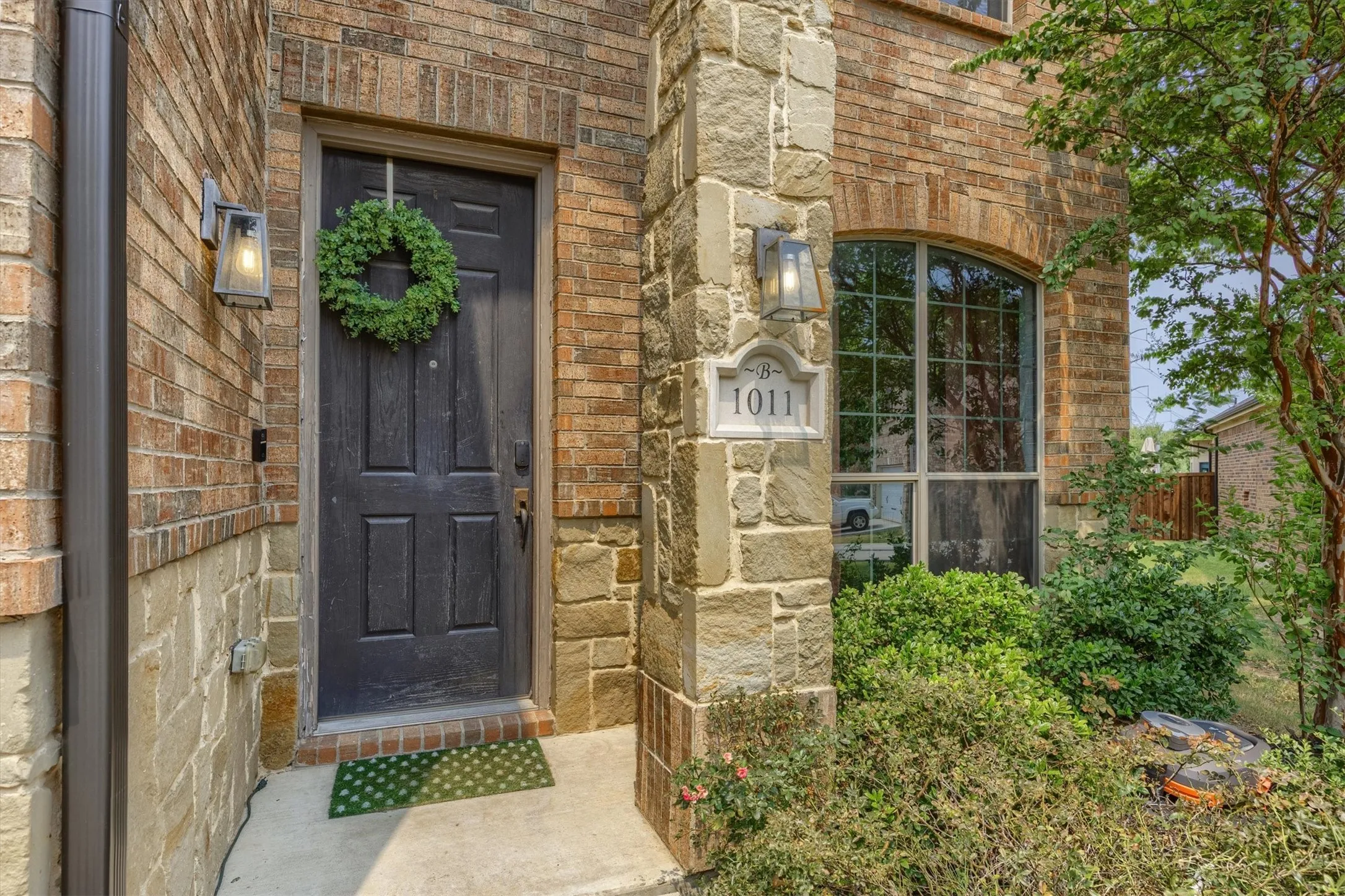 Enjoy the quaint front porch as you enter the home.