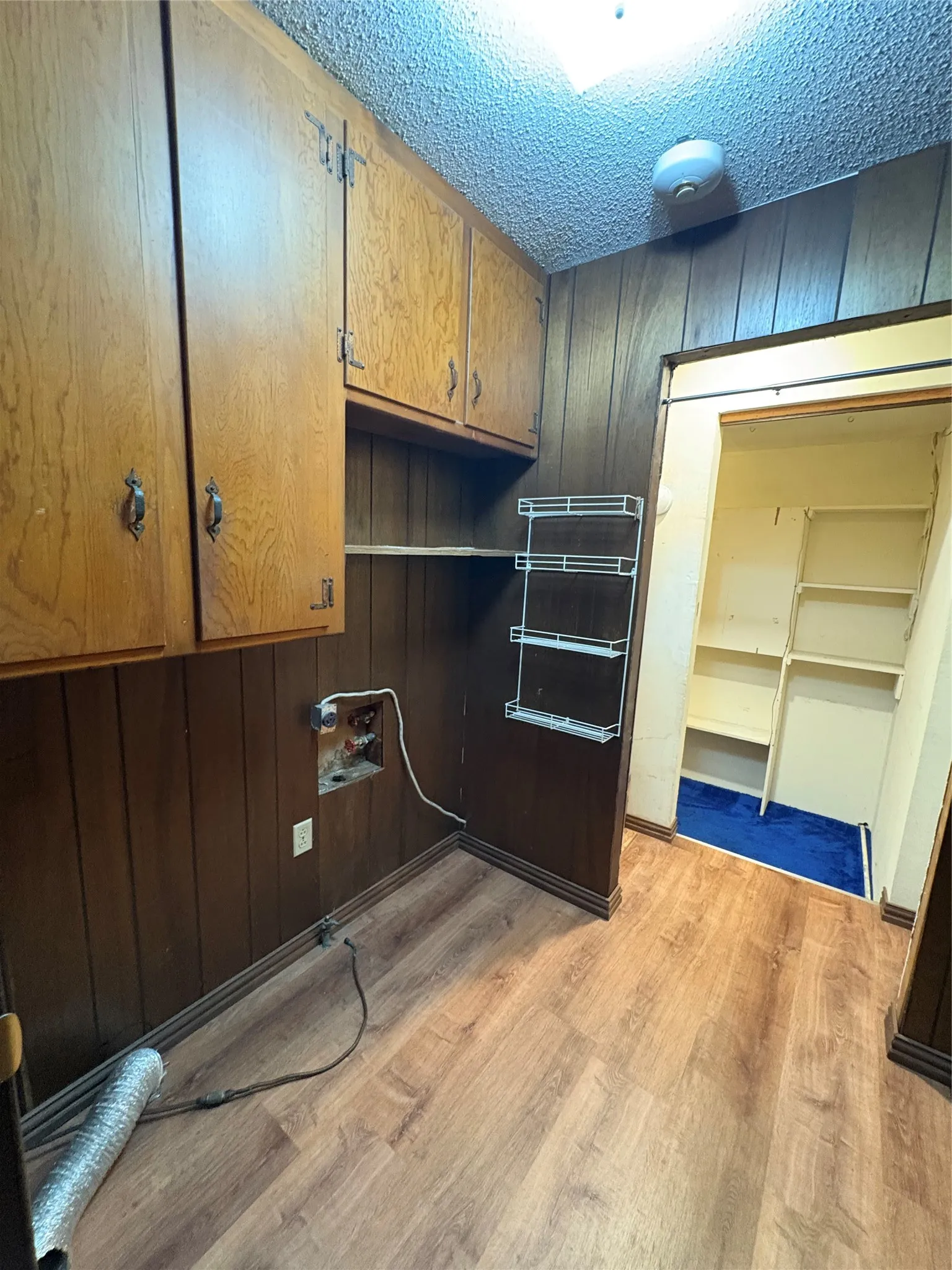 Washer dryer hook up.  Built in cabinets.