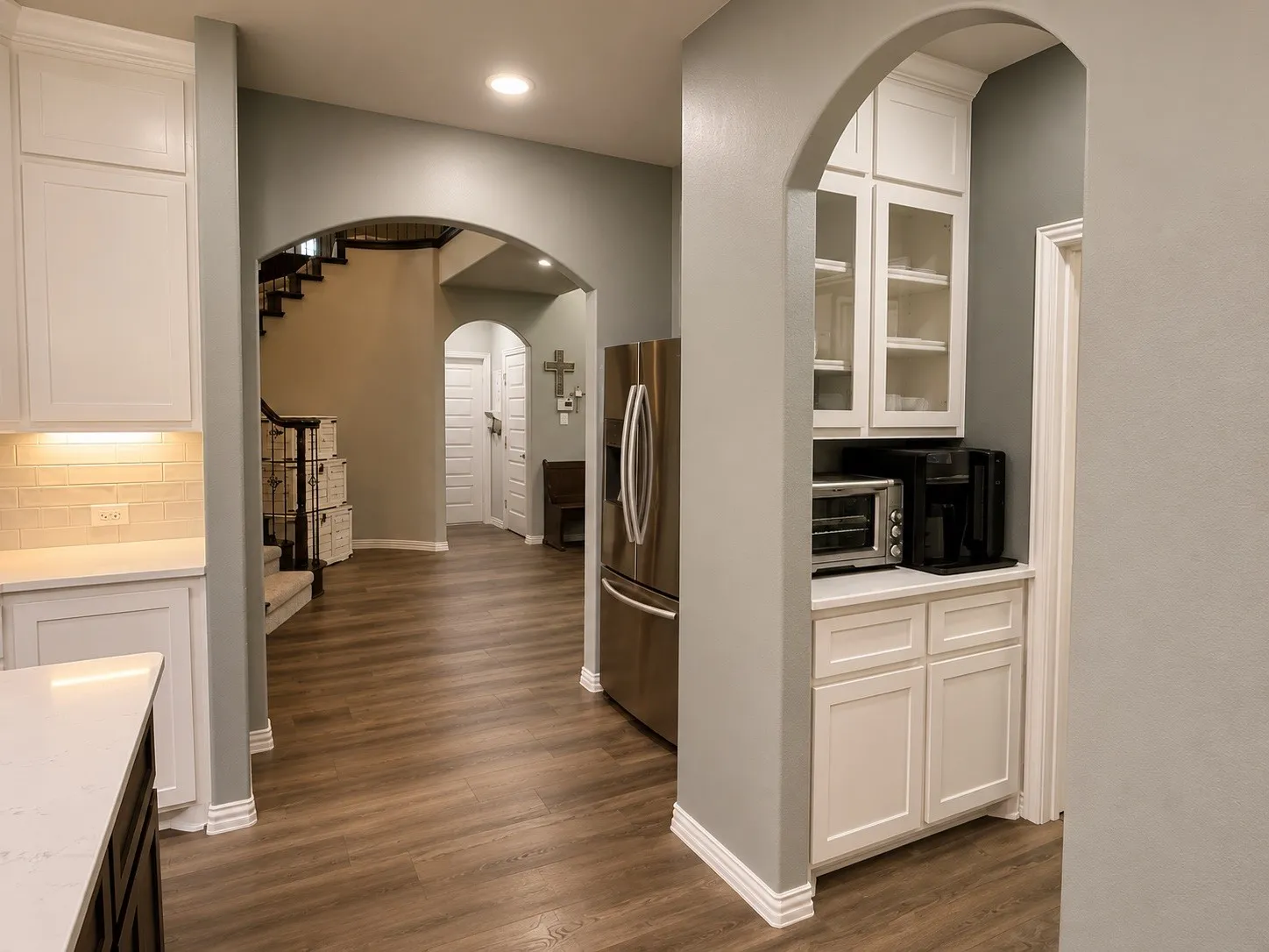 View of entry way connecting to the kitchen and the butler's pantry.