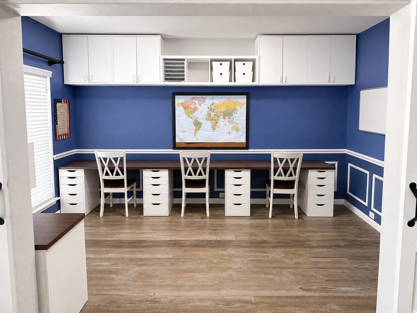 Formal dining room currently being used as a home school room.