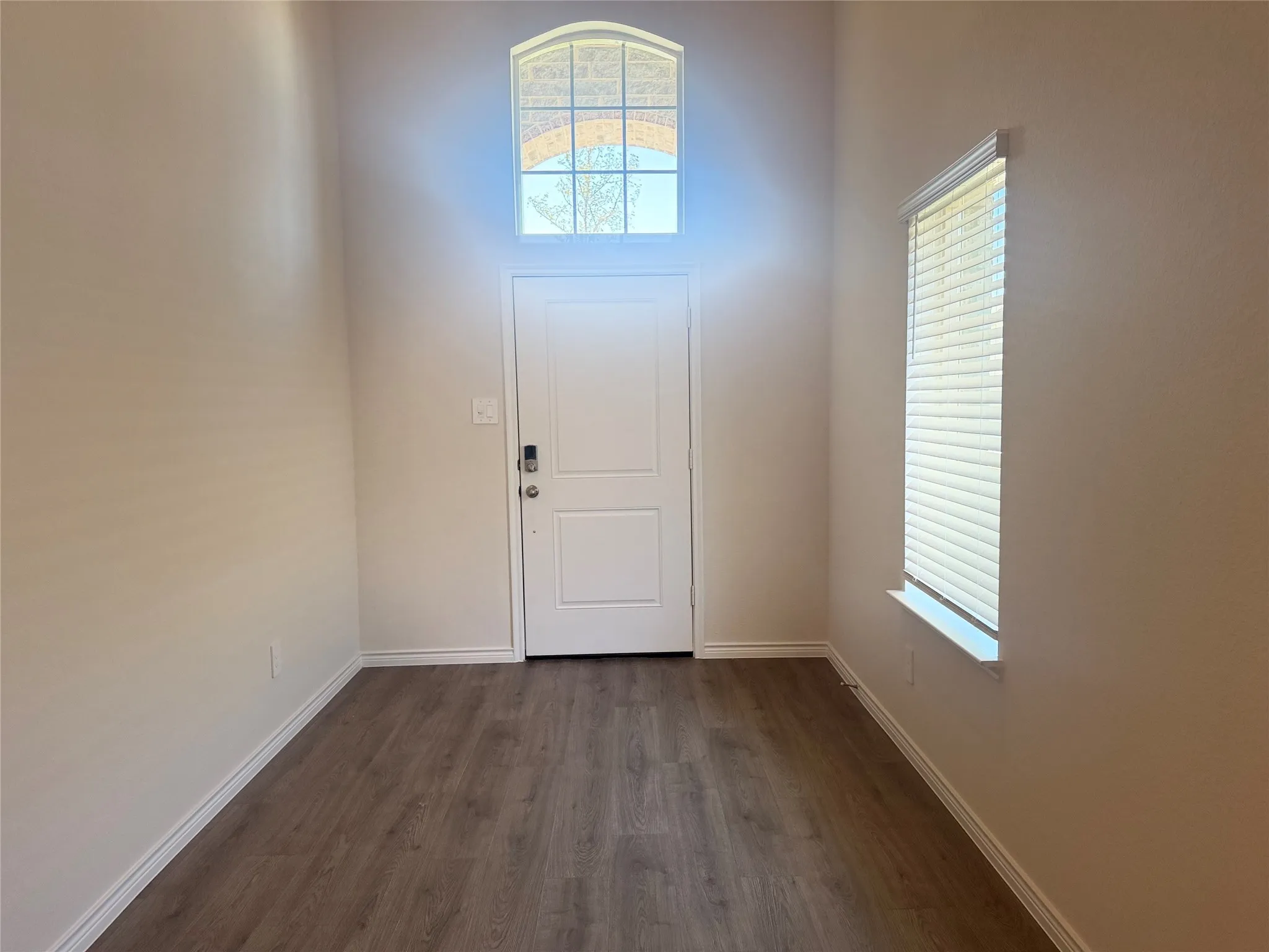 Welcoming foyer featuring a bright, open feel and a seamless transition into the main living areas.