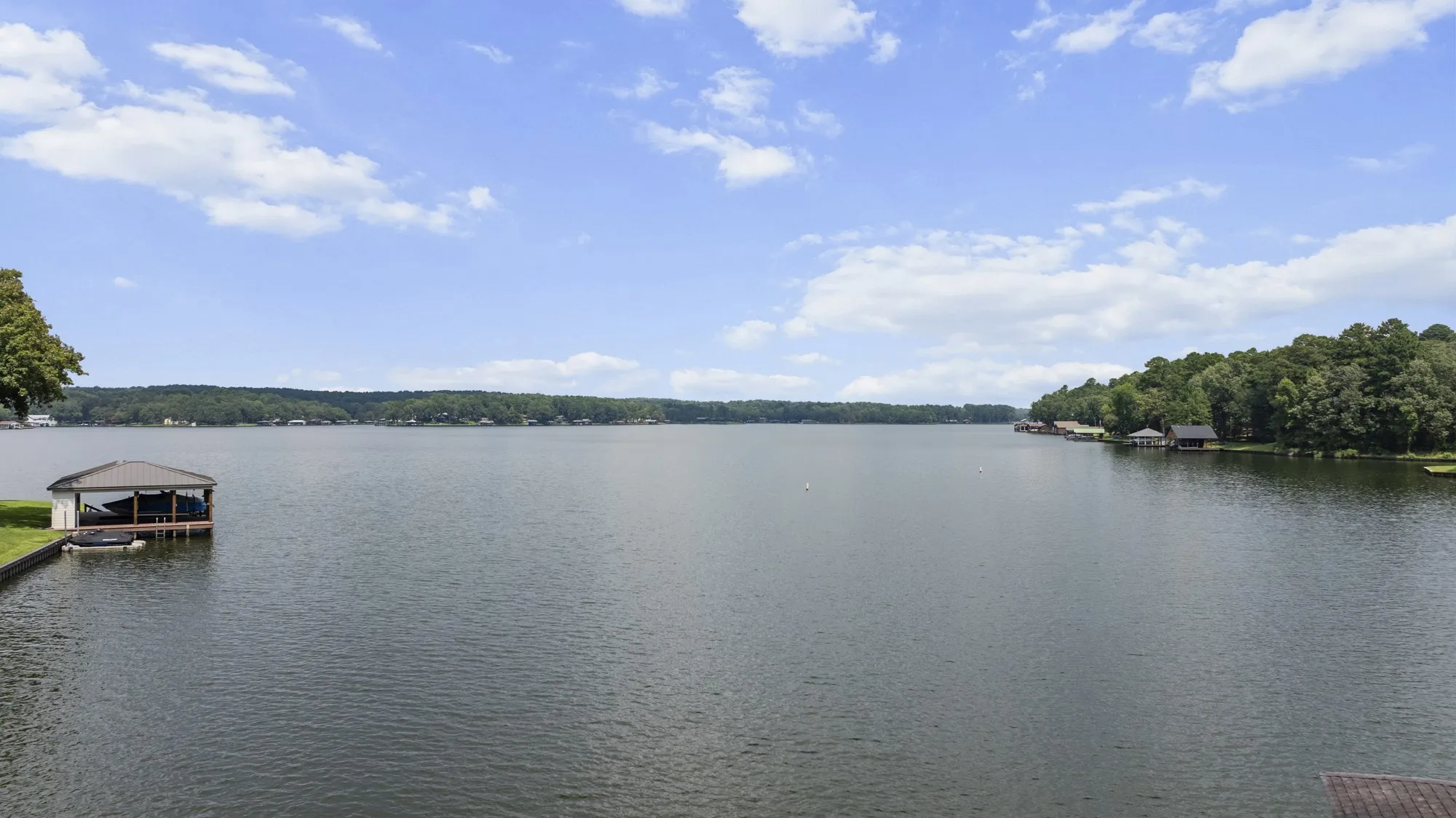 Water view with a boat dock