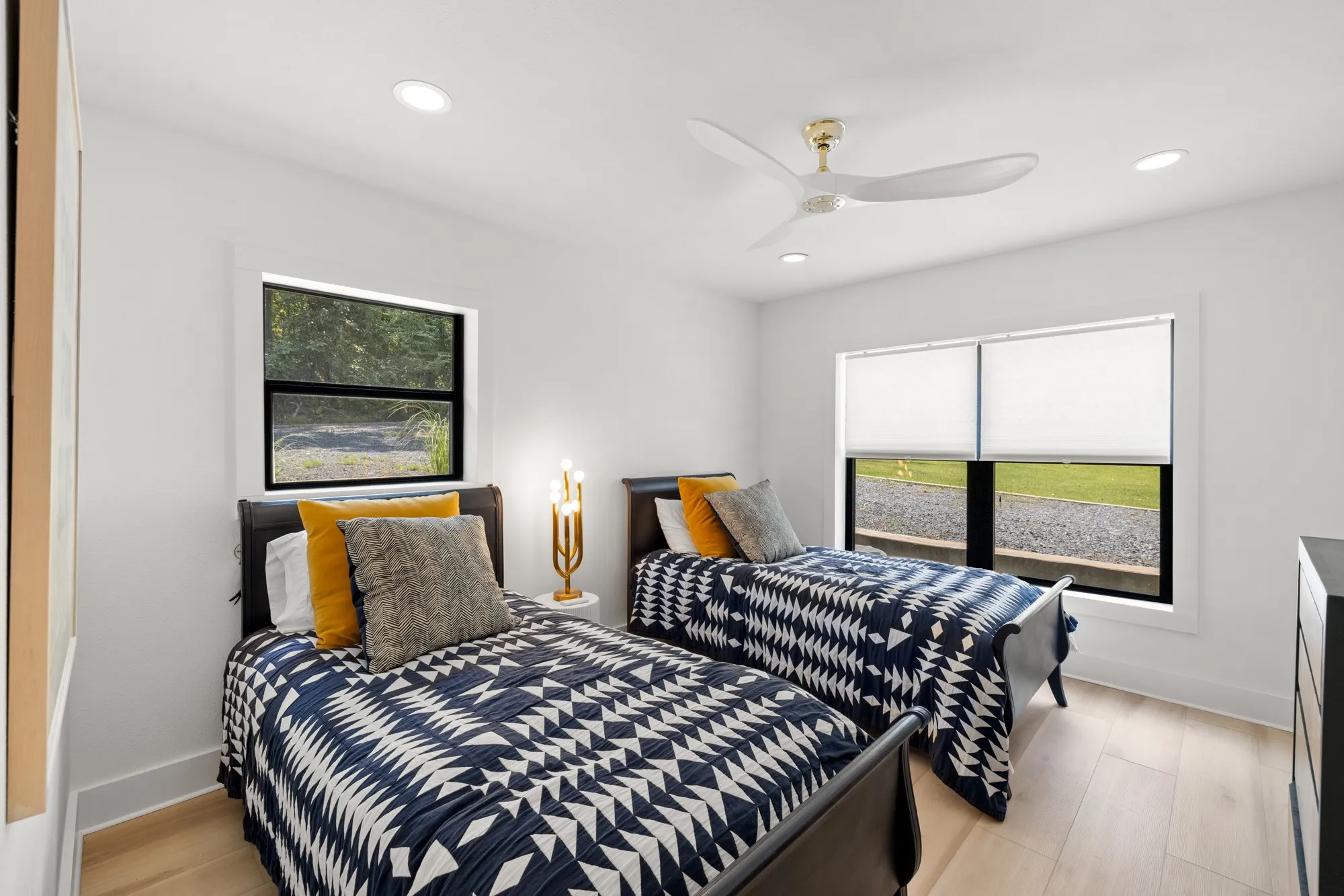 Bedroom featuring recessed lighting, light wood finished floors, and ceiling fan