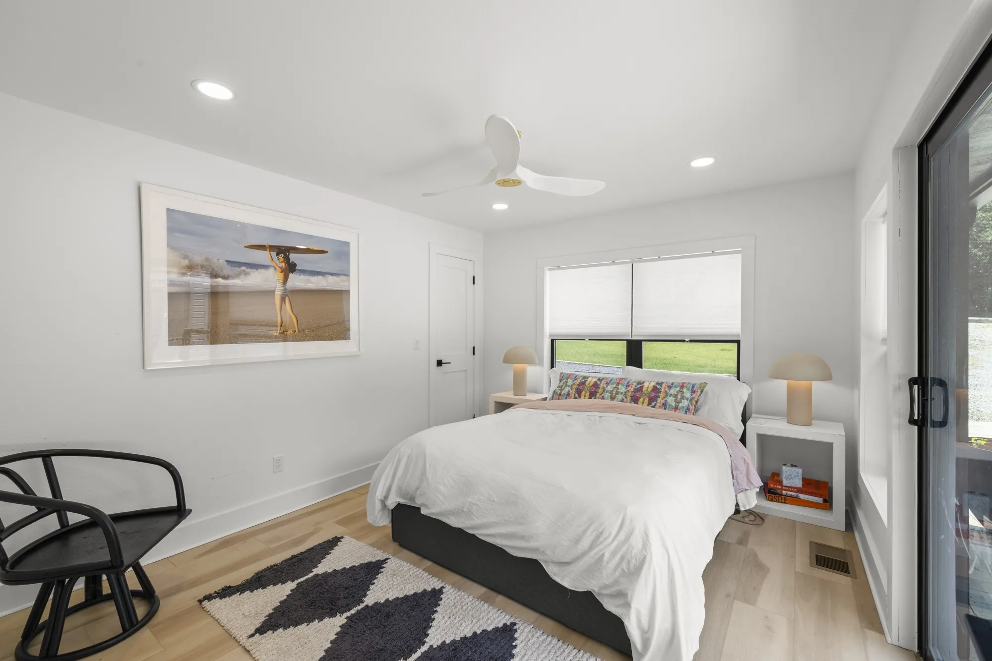 Bedroom featuring recessed lighting, light wood-style flooring, and a ceiling fan