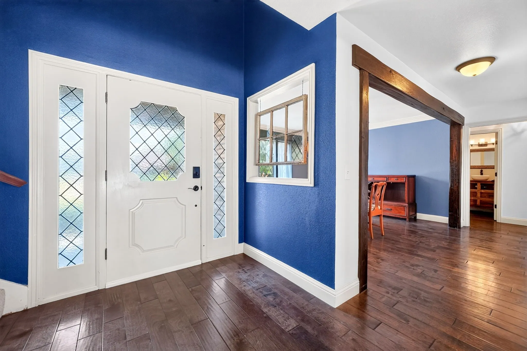 Entryway with wood flooring