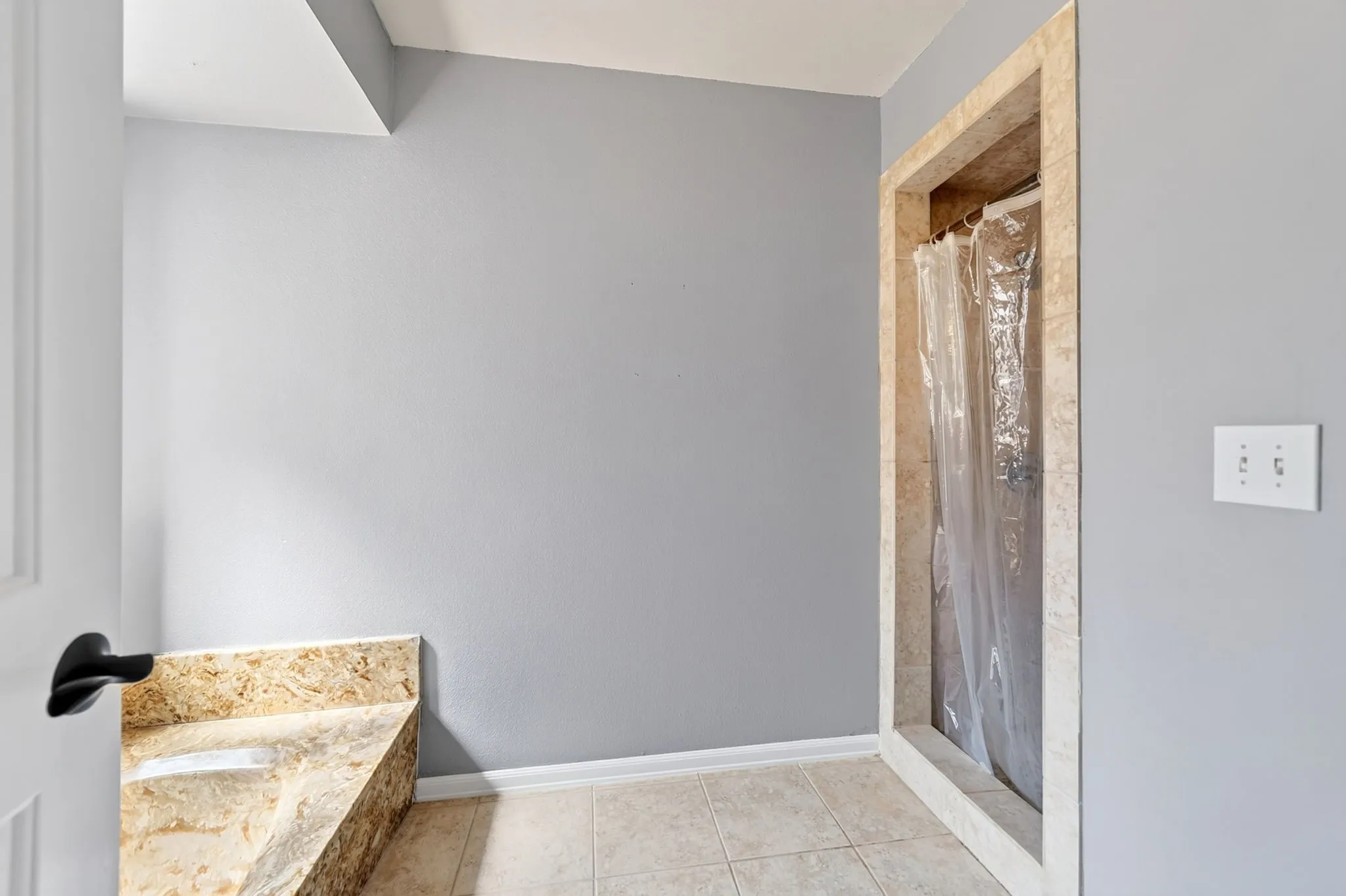Stone tub with walk-in shower