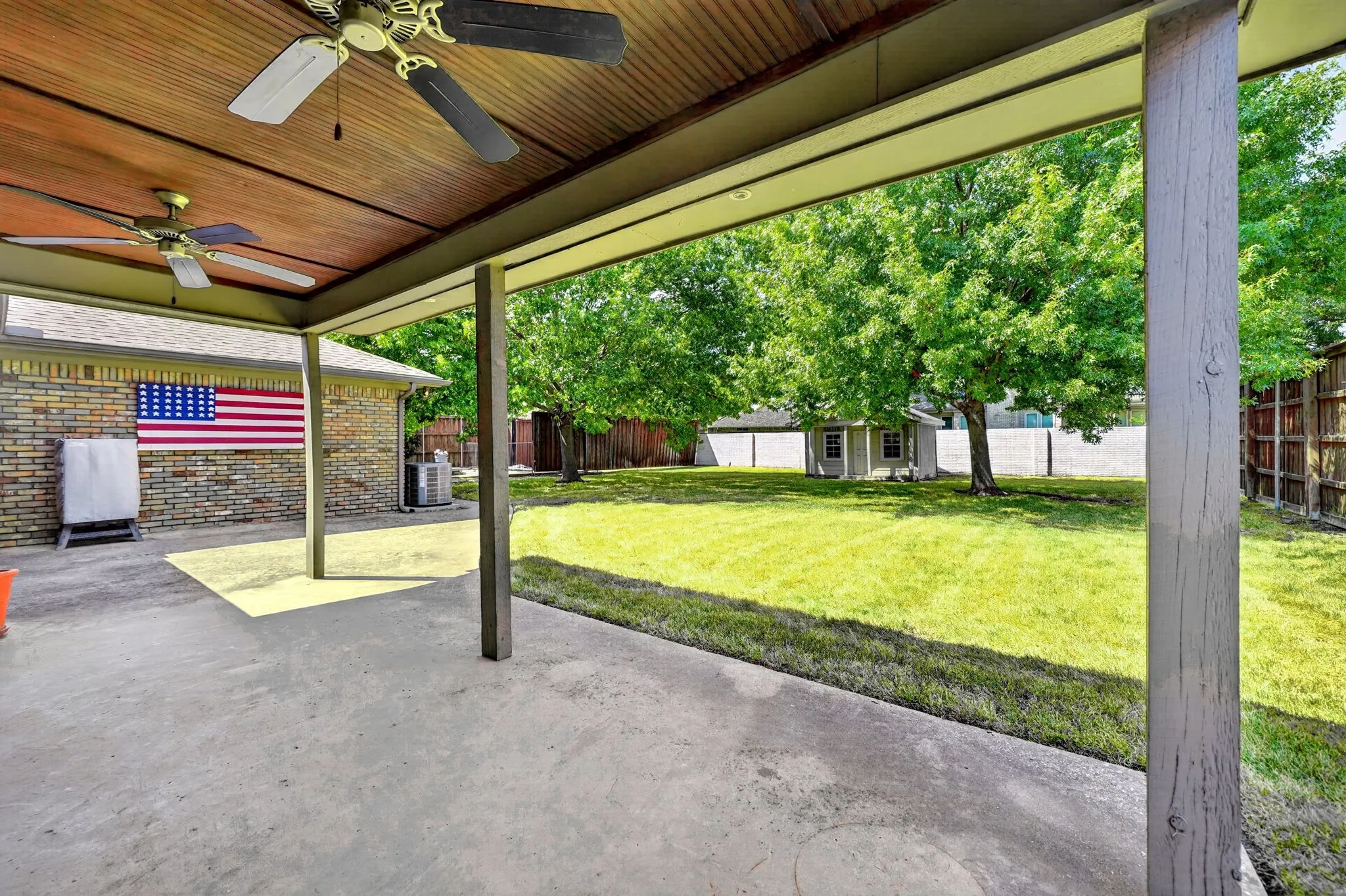 Covered patio with ceiling fans