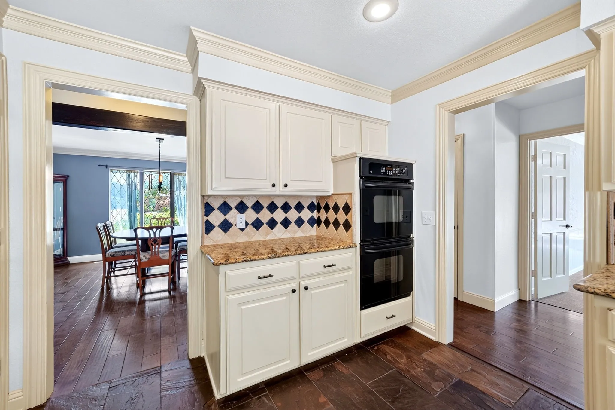 Kitchen leads into main dining room